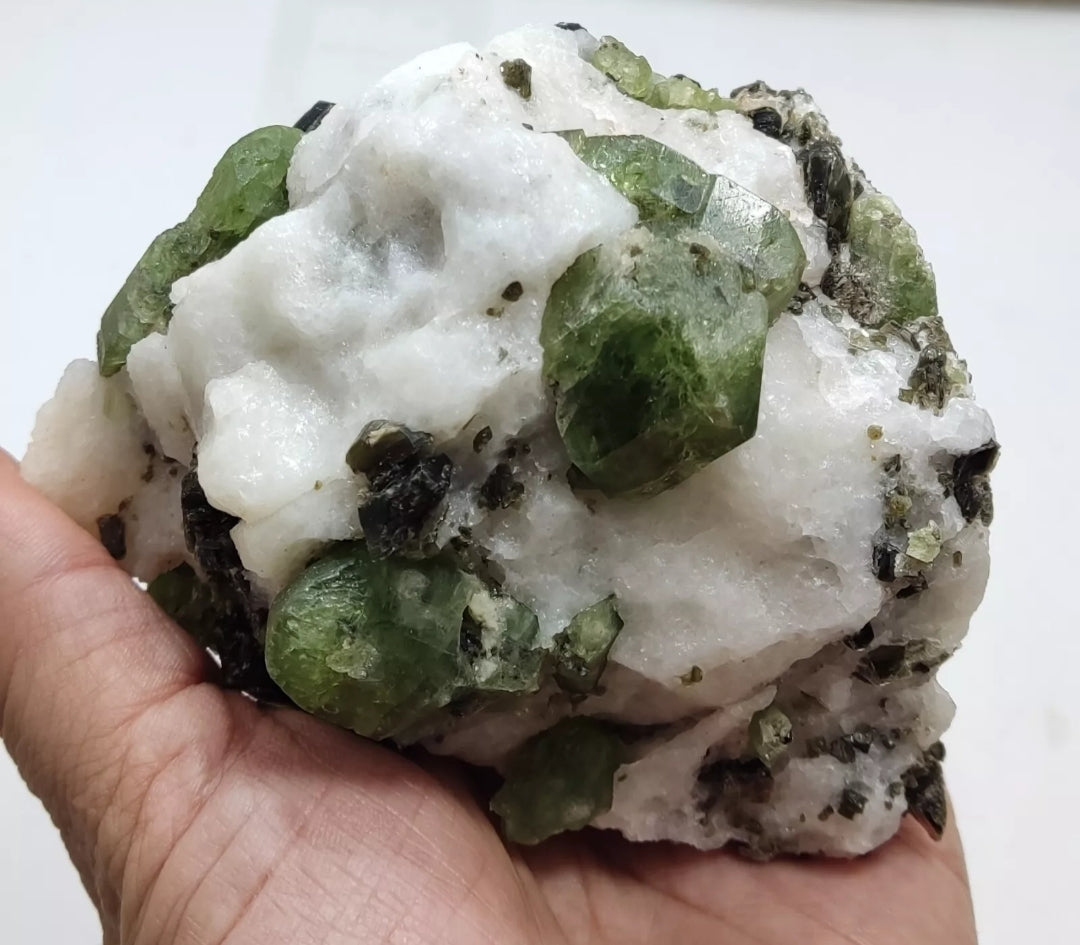 Diopside crystals on matrix with black/dark brown mica 811 grams