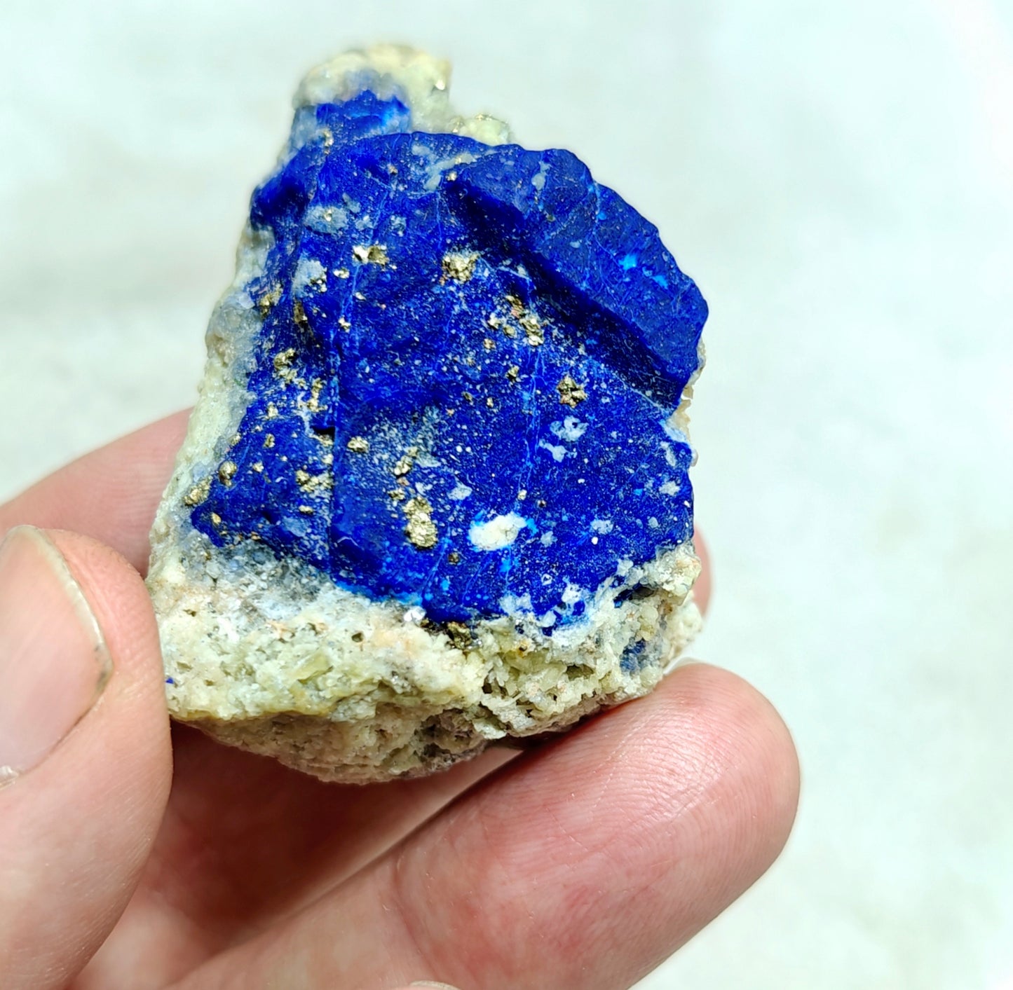 An Aesthetic specimen of Lazurite Lapis with Pyrite partly fluorescent 57g