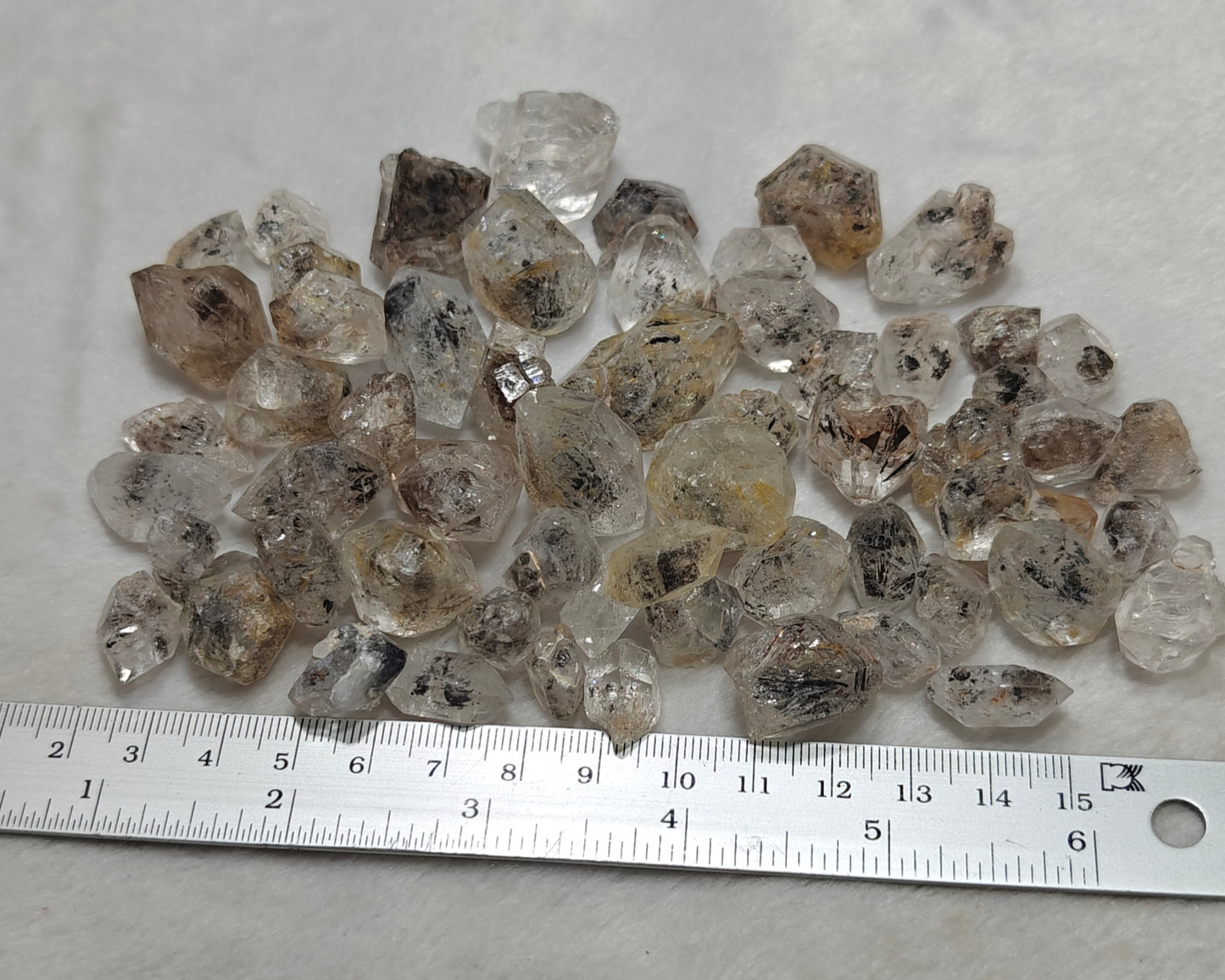 220 grams diamond quartz crystals some with carbon inclusions