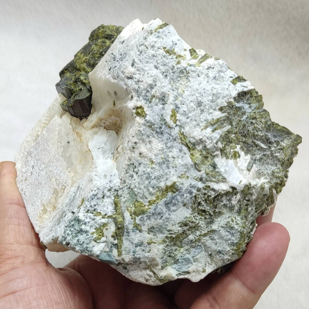 An amazing high lusterous Epidote crystal on matrix with Albite 943 cluster grams