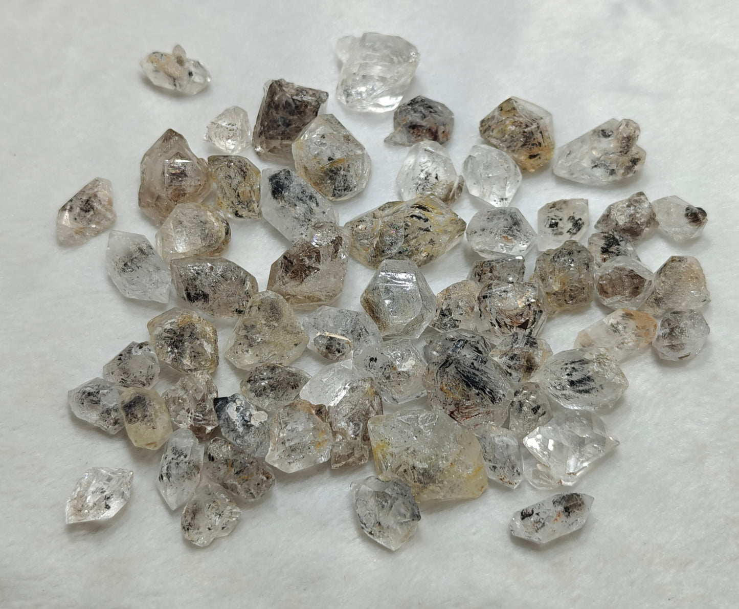 220 grams diamond quartz crystals some with carbon inclusions