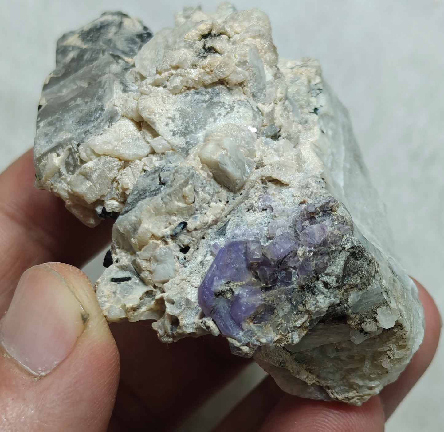 An amazing specimen of purple Apatite crystals on matrix 120 grams
