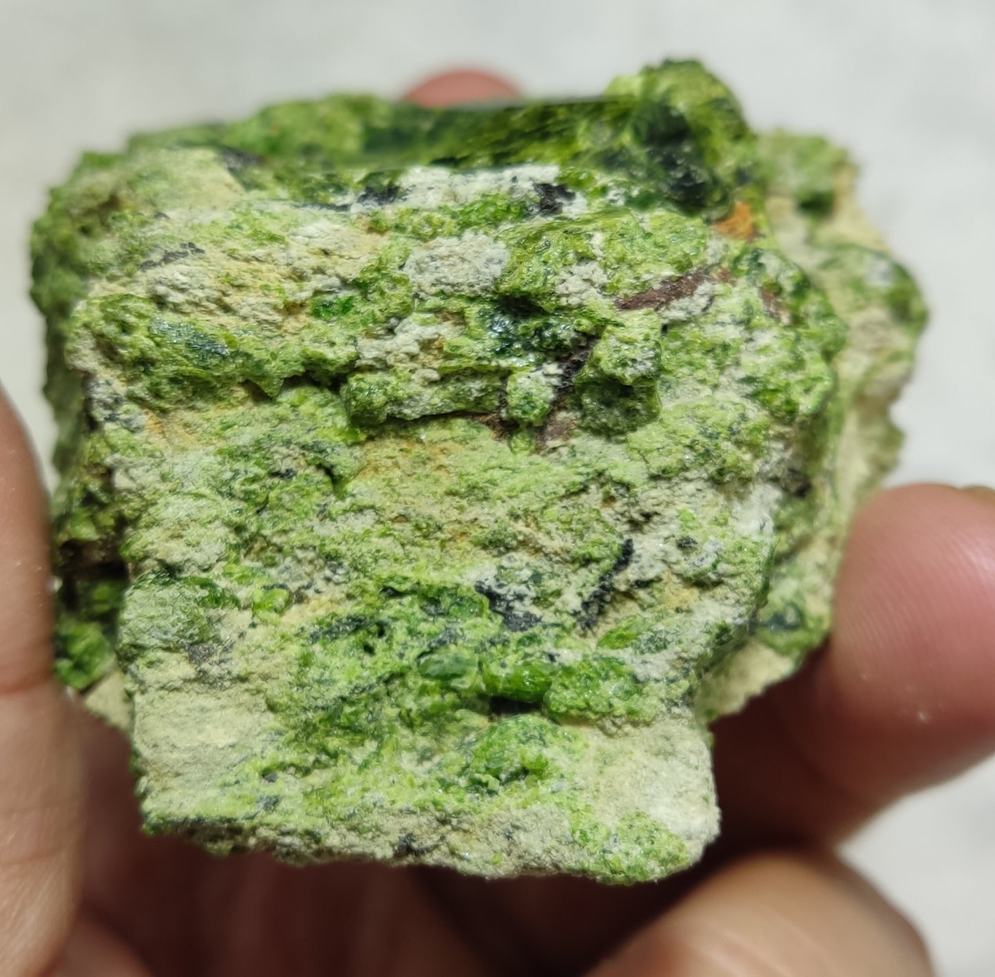 An Aesthetic specimen of garnet variety demantoid crystals on Matrix 236  grams