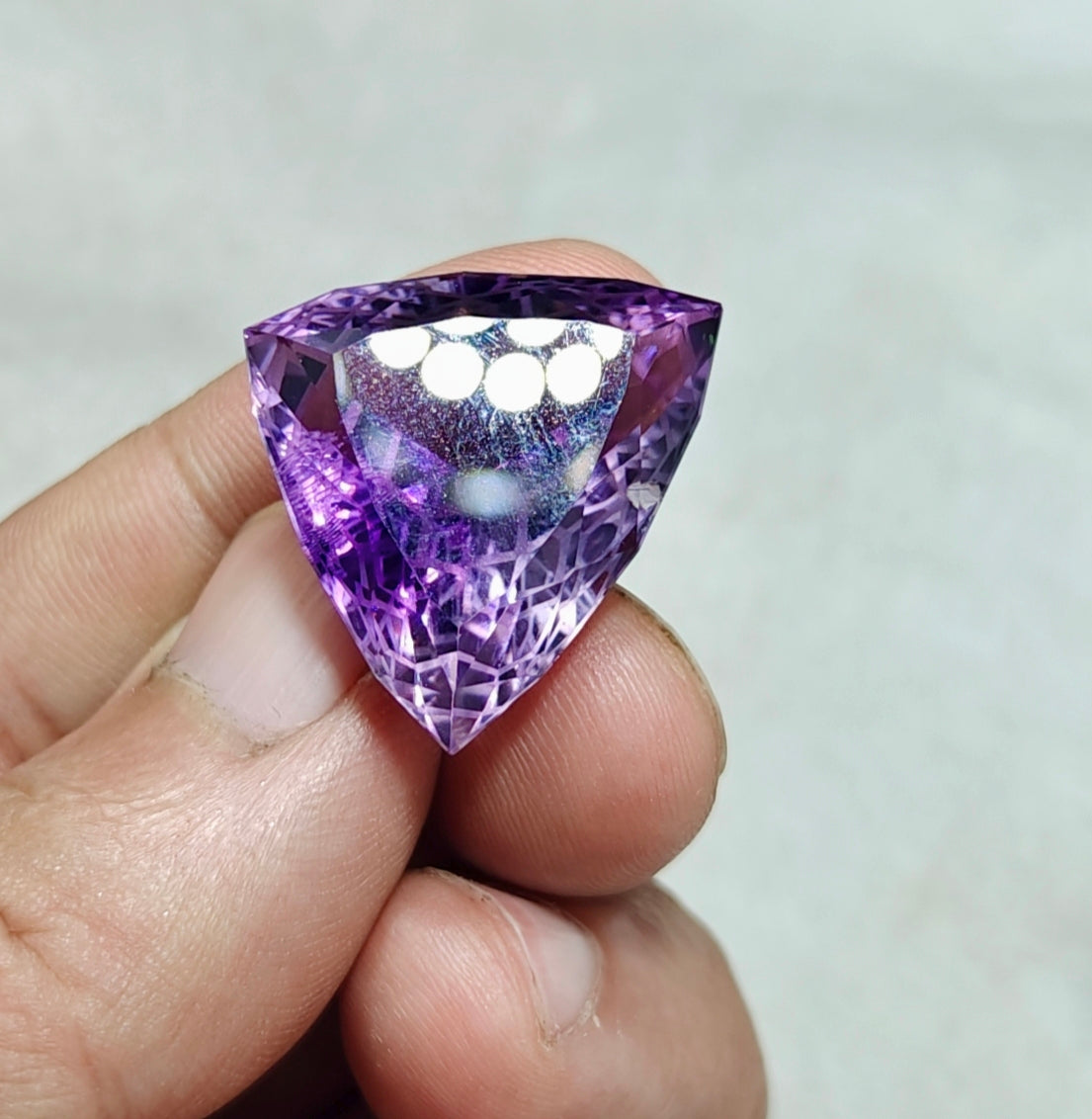An amazing trillion fancy cut faceted amethyst gemstone 46 carats