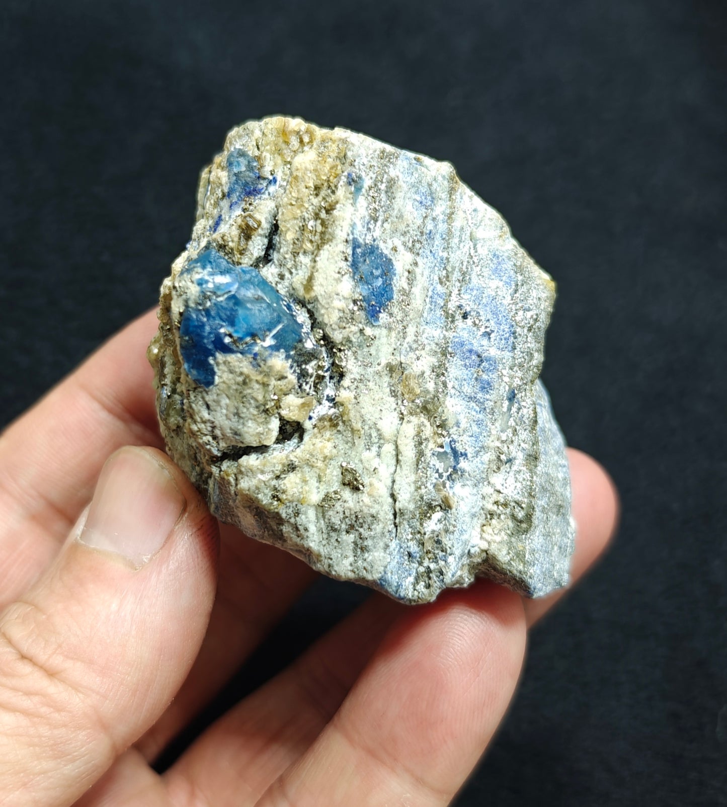 Afghanite Fluorescent in matrix with some pyrite 190 grams