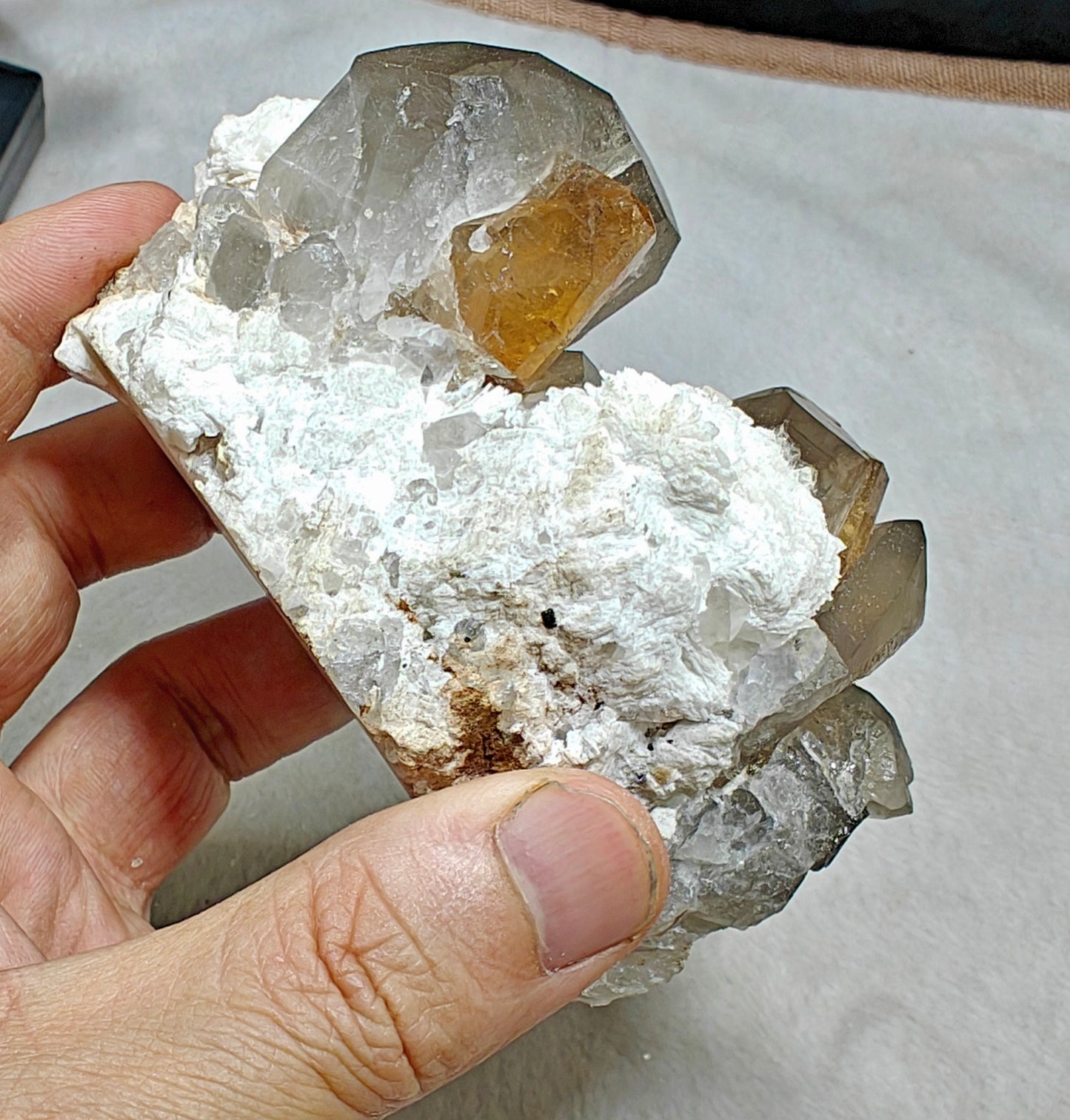 Natural peach color Topaz crystals on matrix with smoky quartz 455 grams