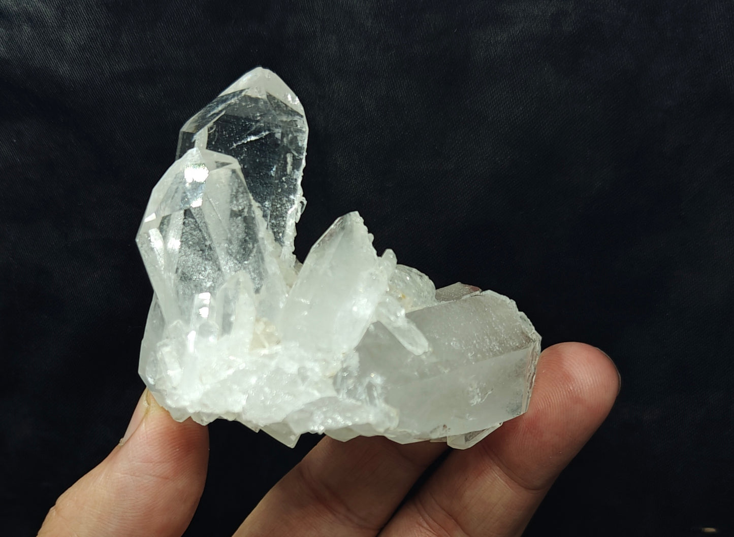 An amazing specimen of clear terminated quartz Crystals 193 grams