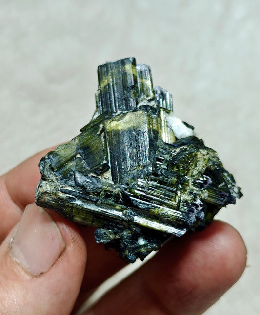 Dark green color Tourmaline crystal with chatoyance effect 50 grams