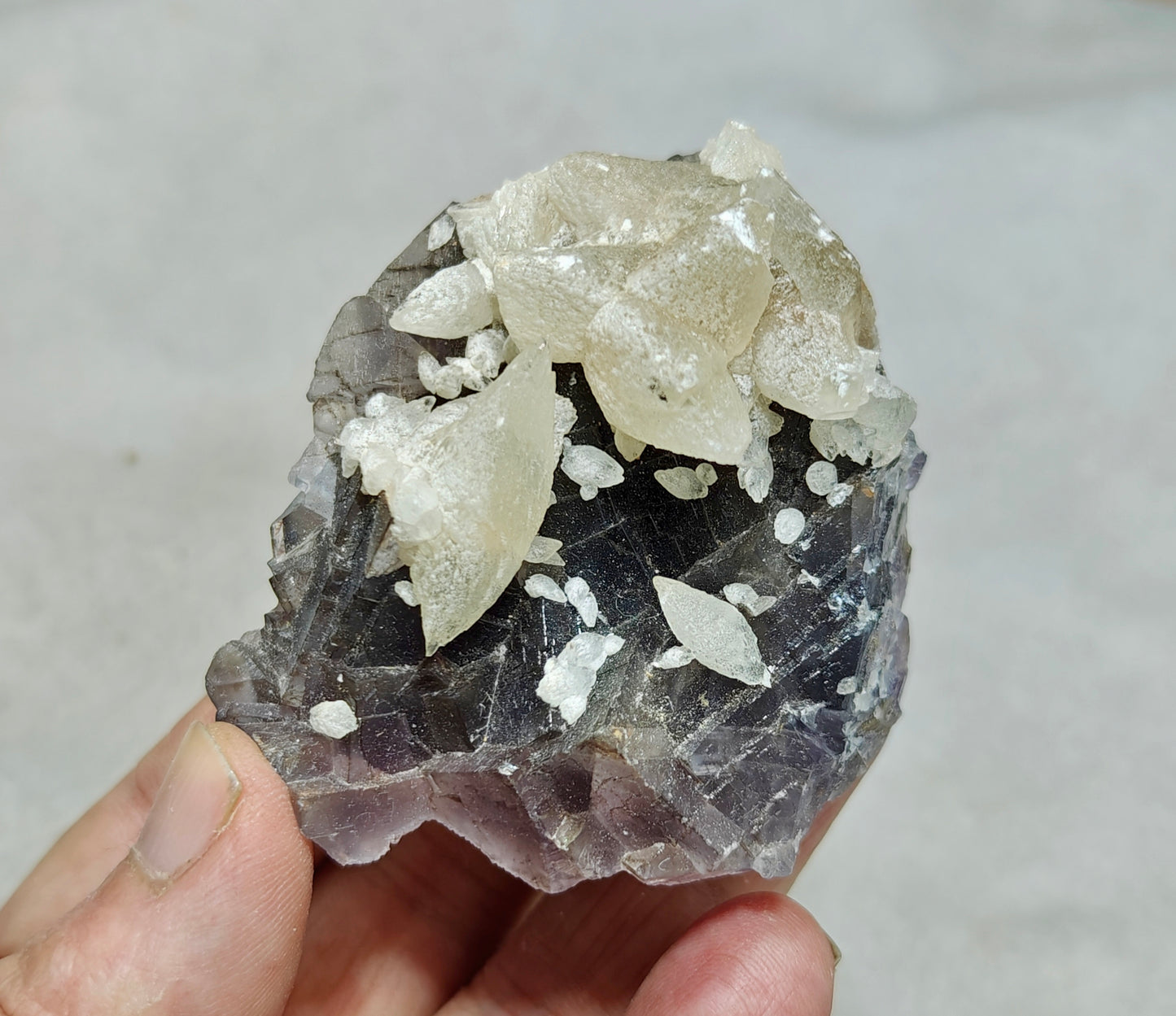 An amazing Single beautiful specimen of grey fluorite with calcite crystals 165 grams