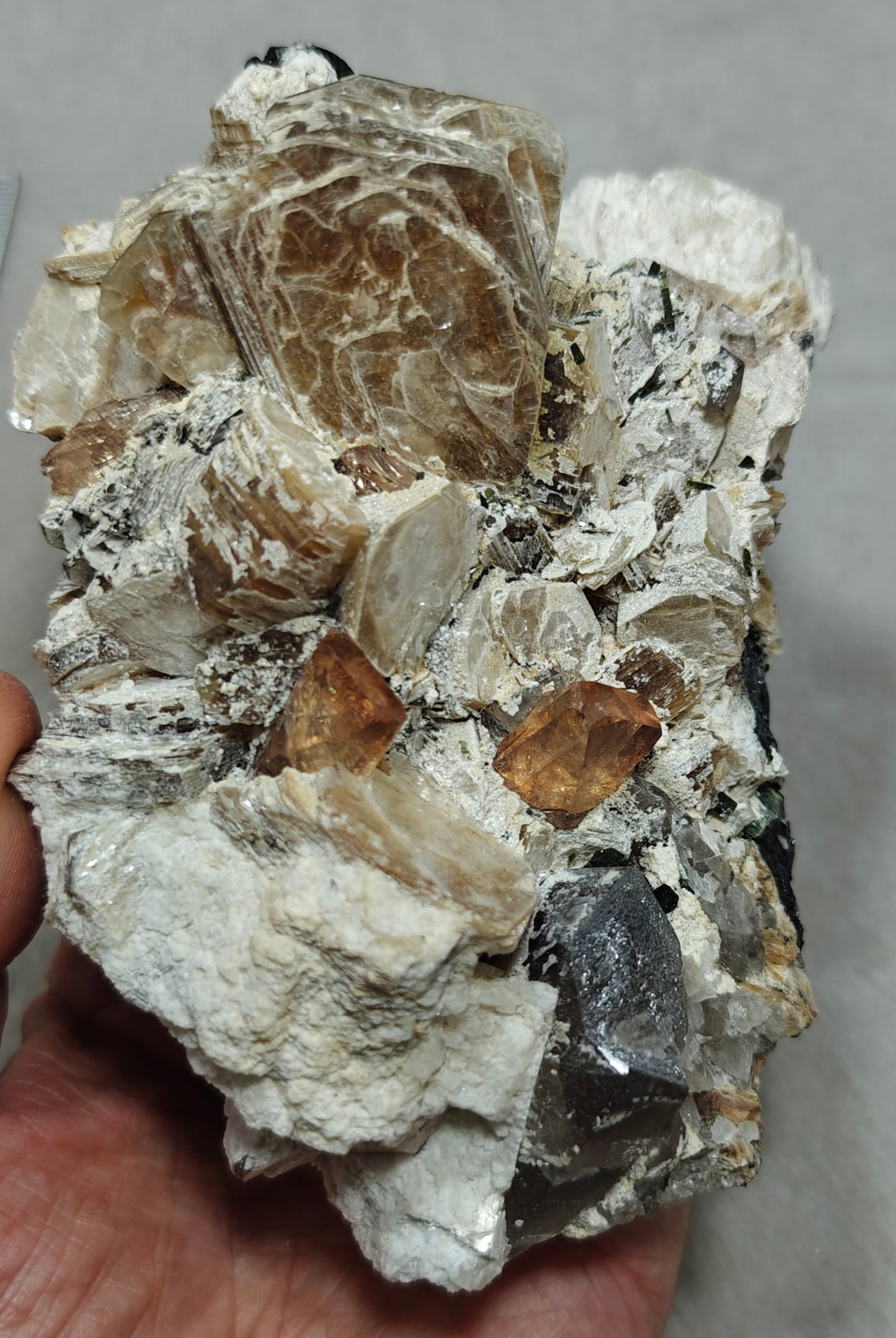peach color Topaz crystals on matrix 686 grams