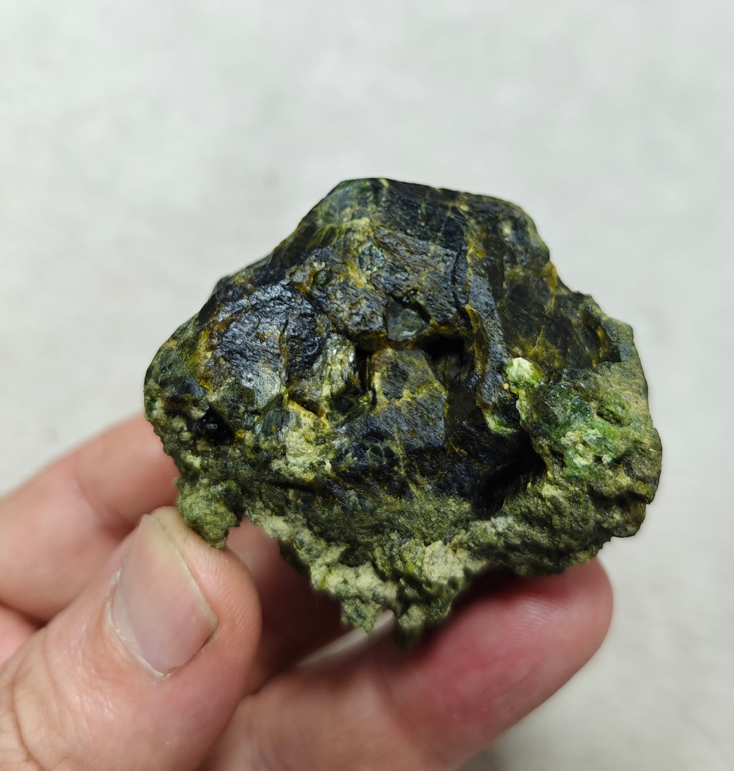 Natural green garnet variety demantoid crystal 142 grams