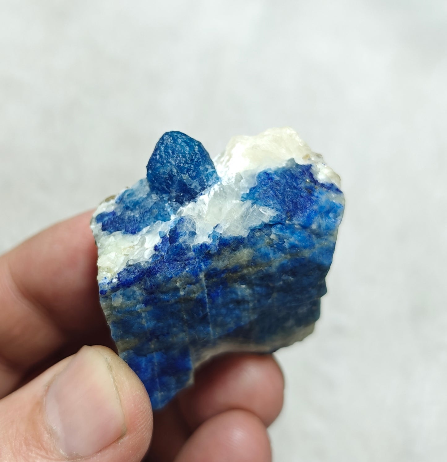 Fluorescent Afghanite/lazurite on matrix with pyrite 58 grams