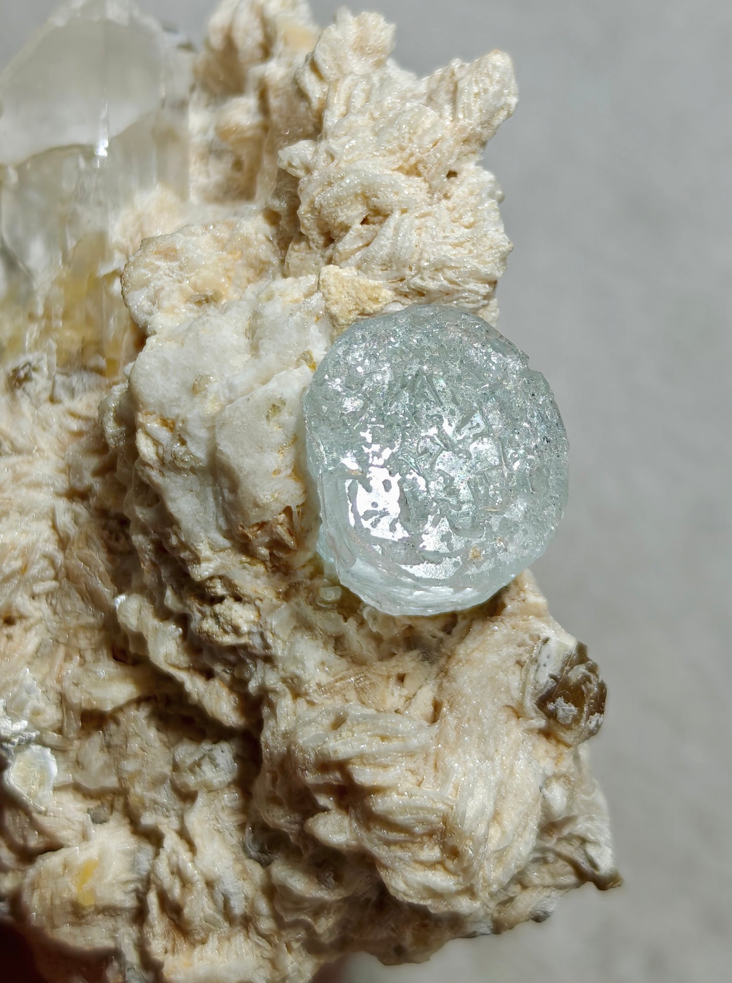 An aesthetic Specimen of etched Aquamarine on matrix with quartz 206 grams