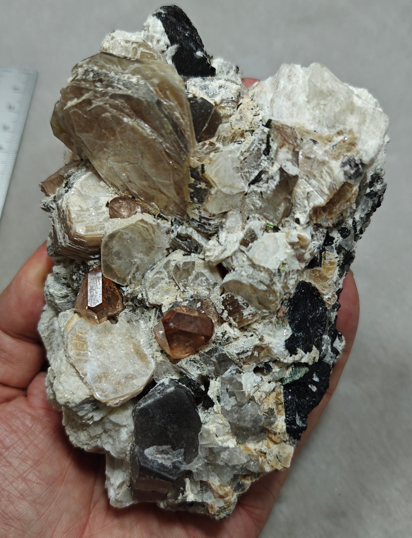 peach color Topaz crystals on matrix 686 grams