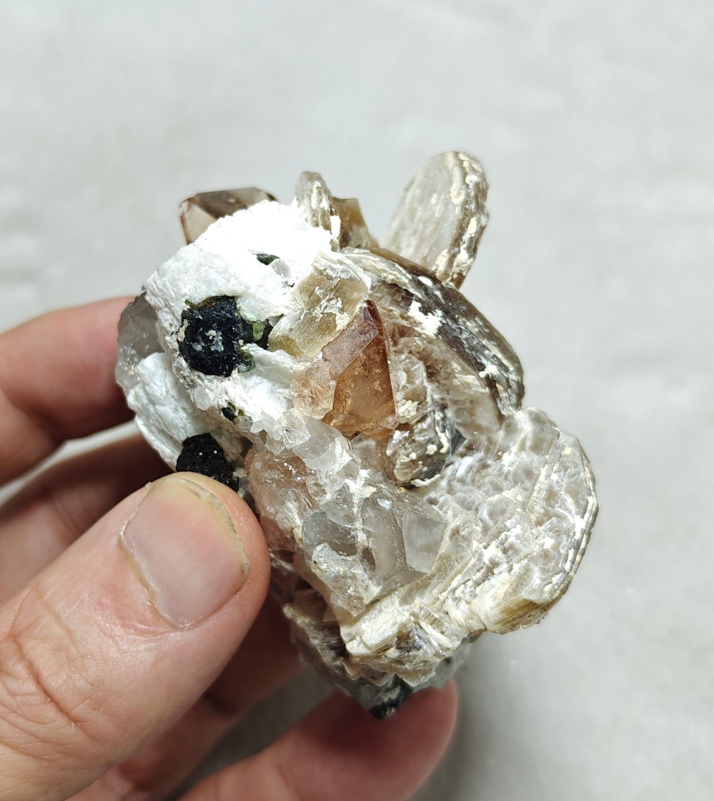 peach color Topaz crystals with quartz and tourmaline 210 grams