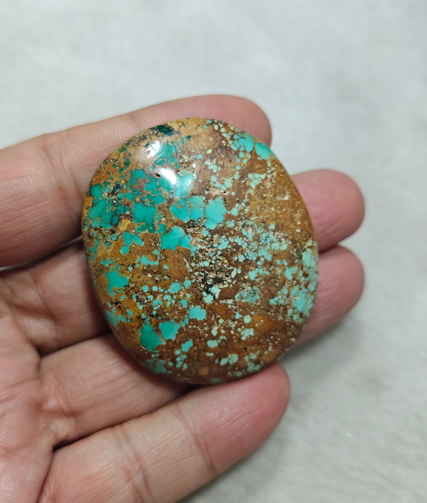 An amazing middle eastern natural turquoise Cabochon in matrix 44 grams