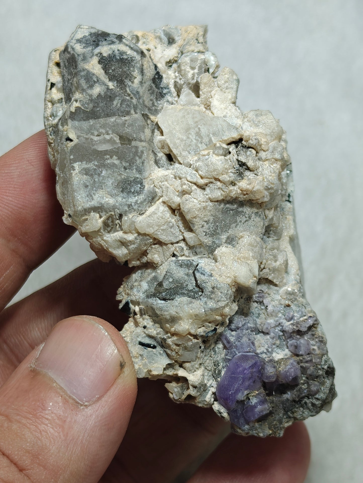 An amazing specimen of purple Apatite crystals on matrix 120 grams