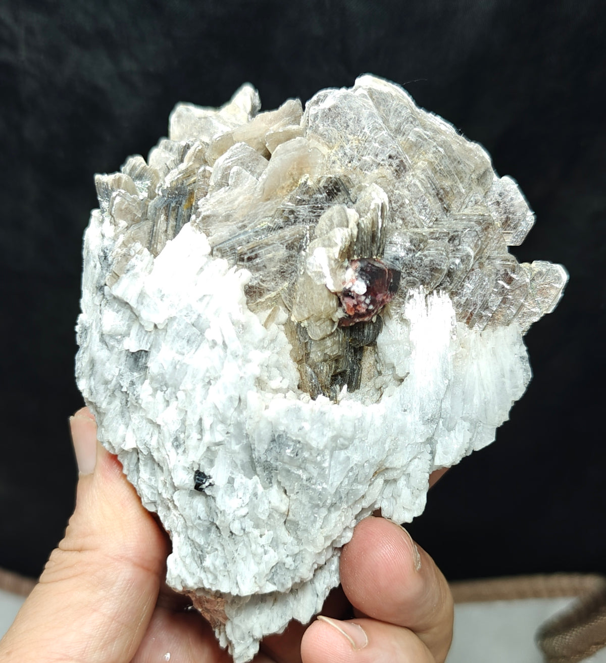 Natural spessartine garnet embedded in muscovite and albite 433 grams