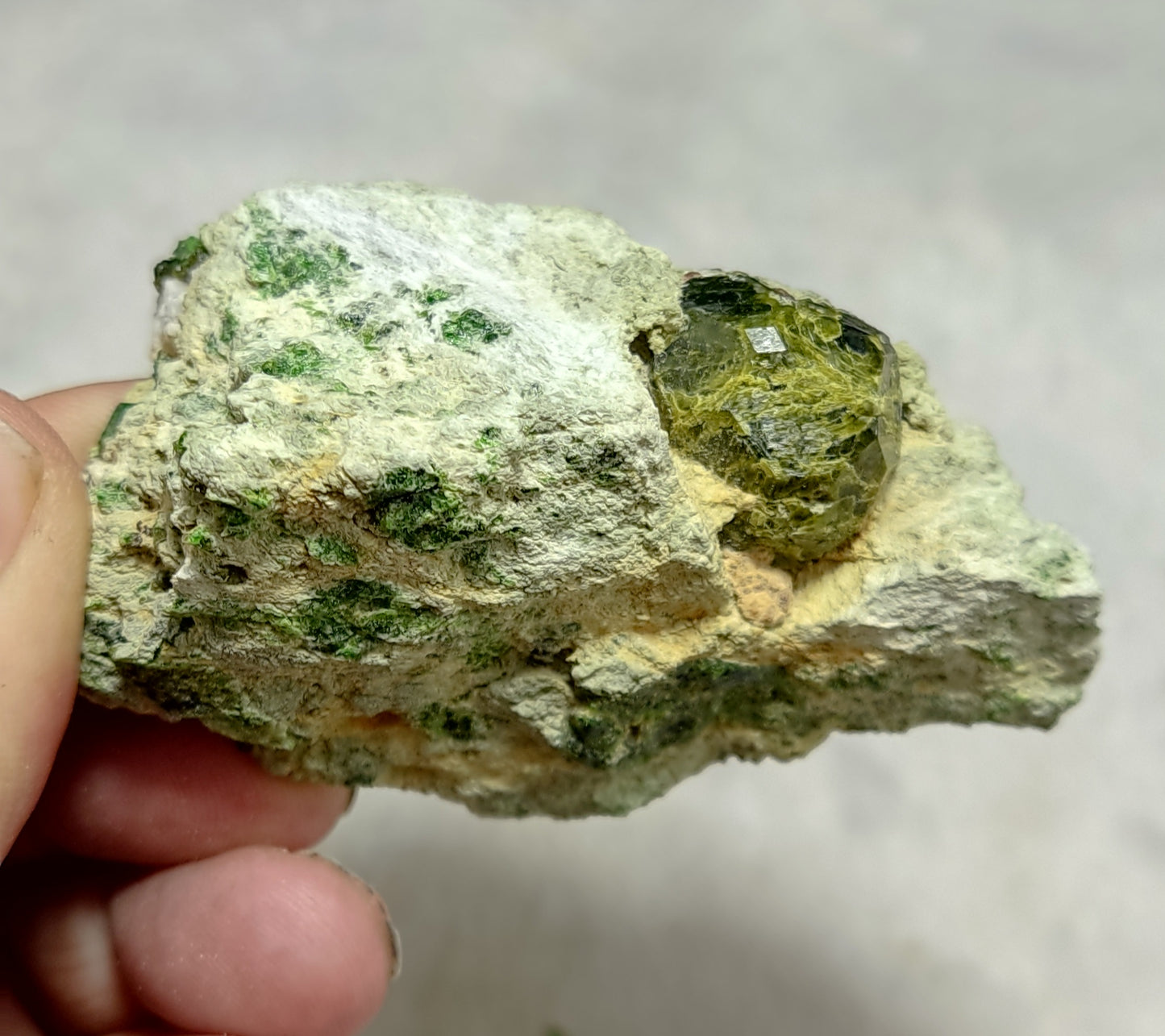 An Aesthetic specimen of garnet variety demantoid crystal On Matrix 140  grams