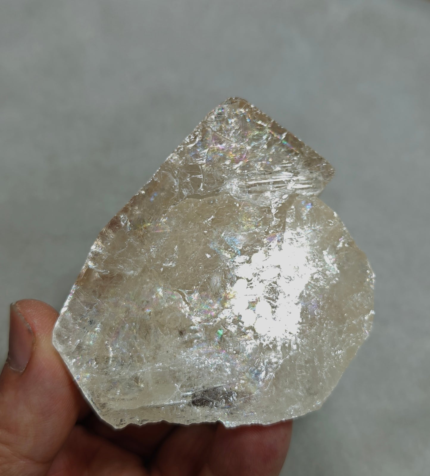 Natural light peach color Topaz crystal with rainbow effects with associated tourmaline 200 grams