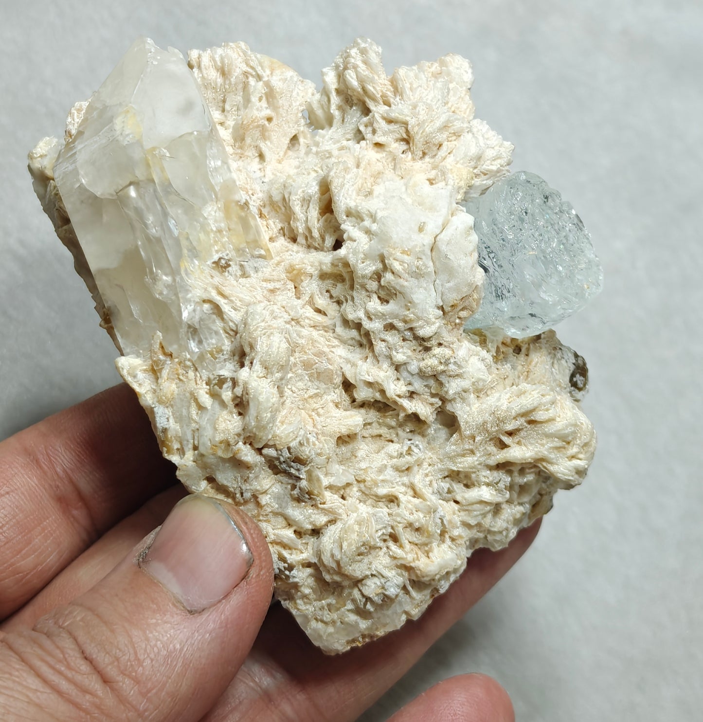 An aesthetic Specimen of etched Aquamarine on matrix with quartz 206 grams