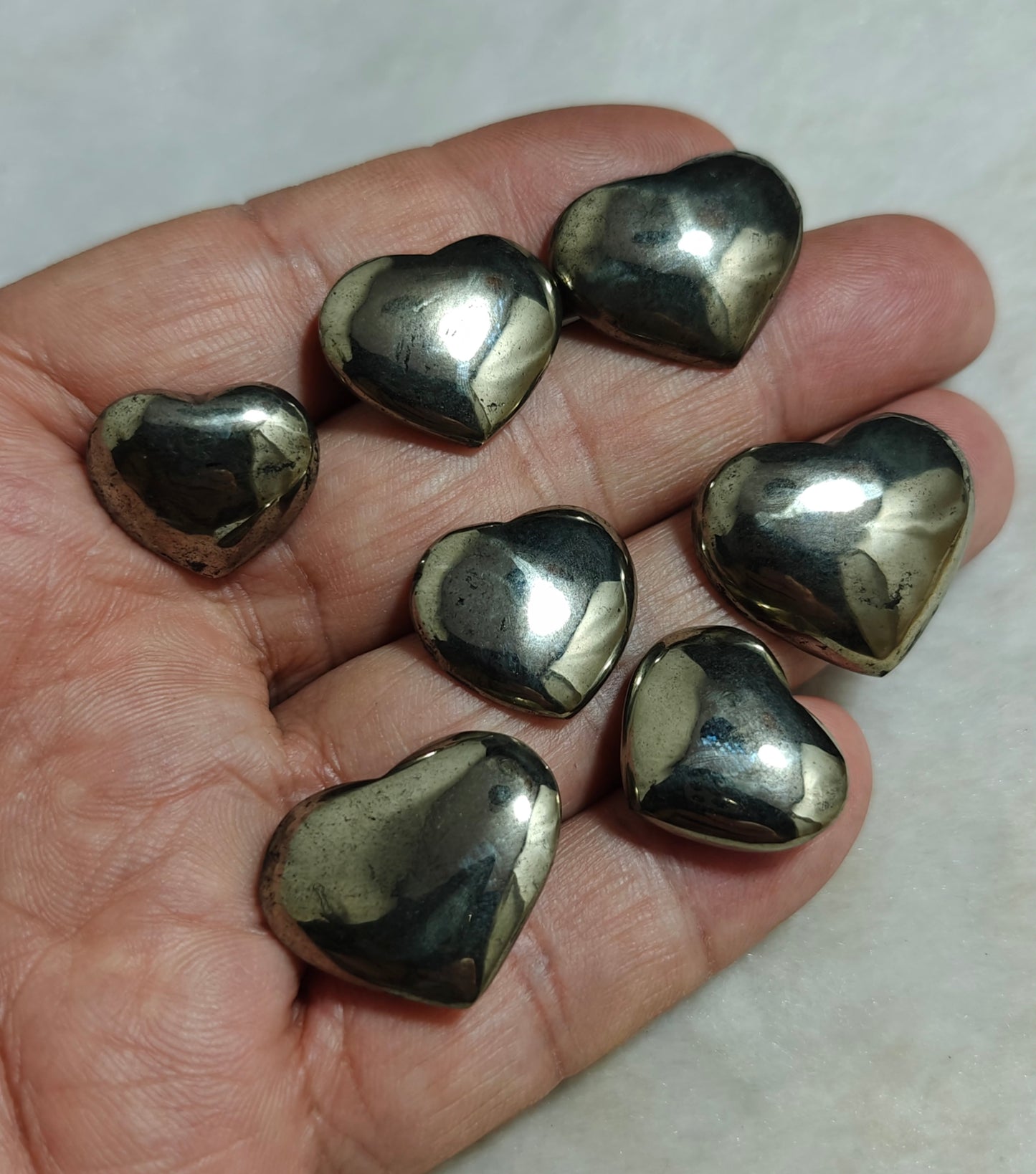7 pyrite carvings heart shapes