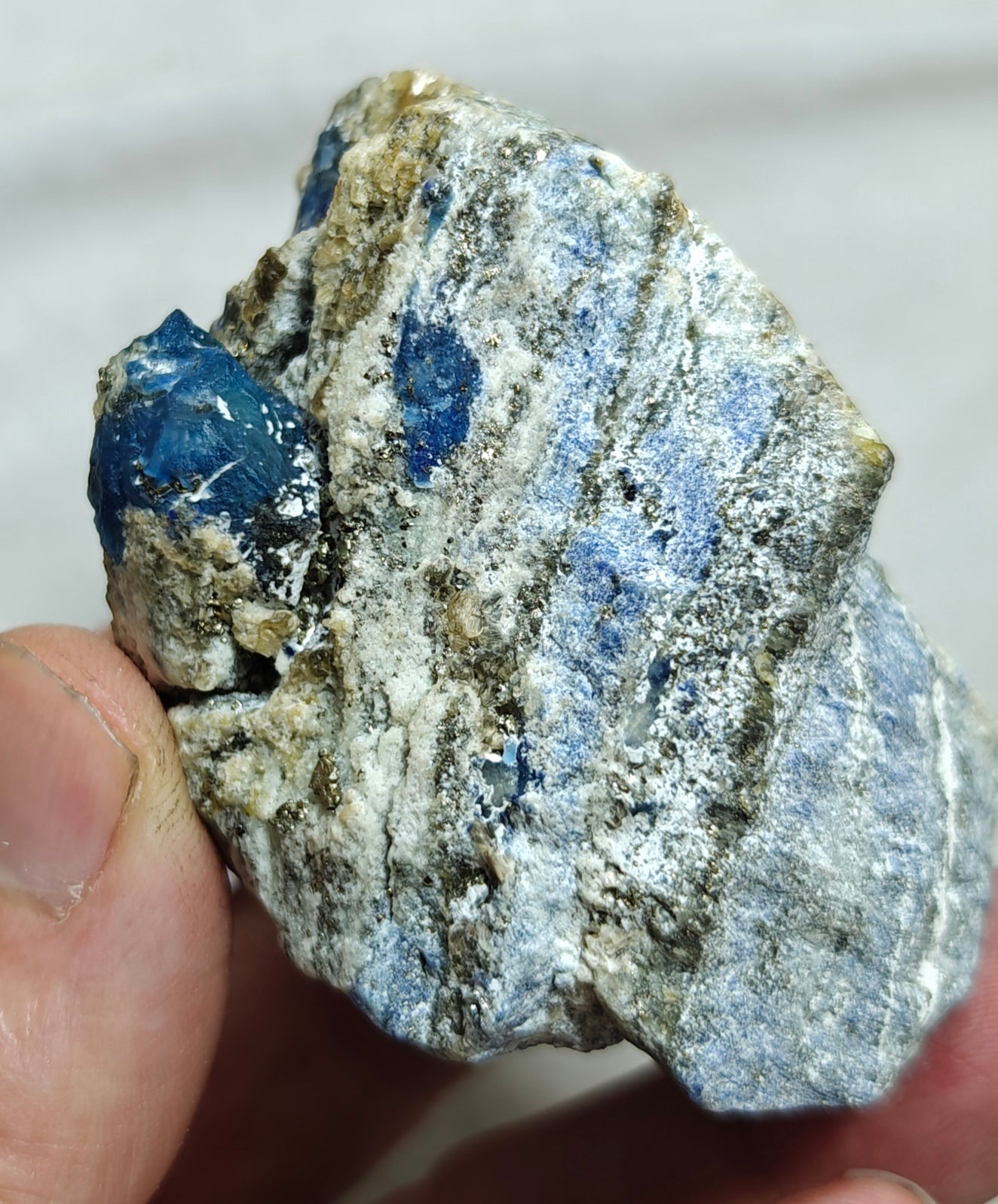 Afghanite Fluorescent in matrix with some pyrite 190 grams