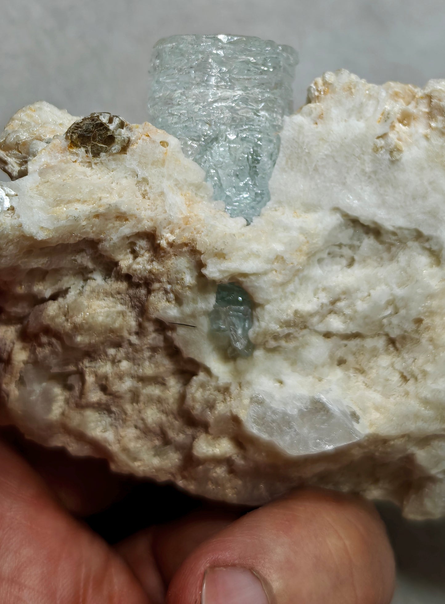 An aesthetic Specimen of etched Aquamarine on matrix with quartz 206 grams