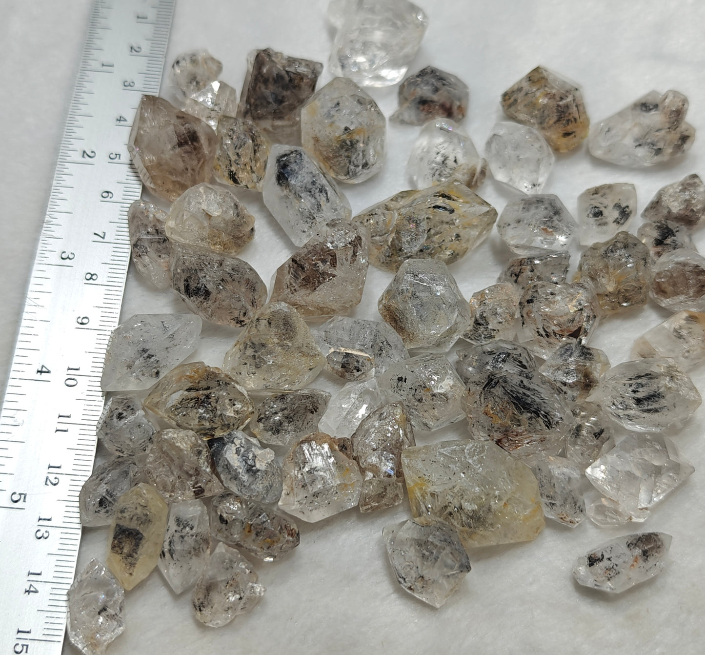 220 grams diamond quartz crystals some with carbon inclusions