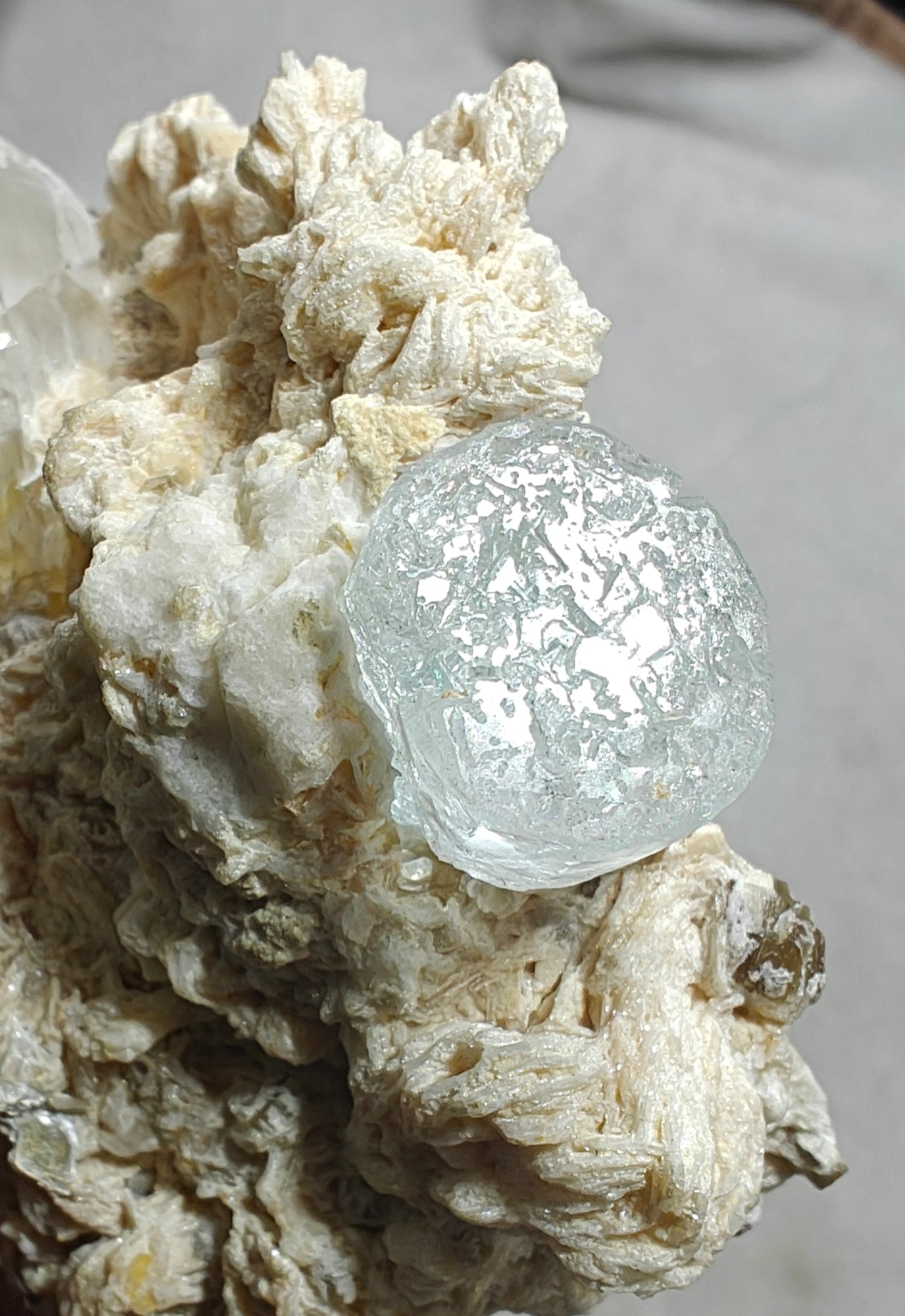 An aesthetic Specimen of etched Aquamarine on matrix with quartz 206 grams