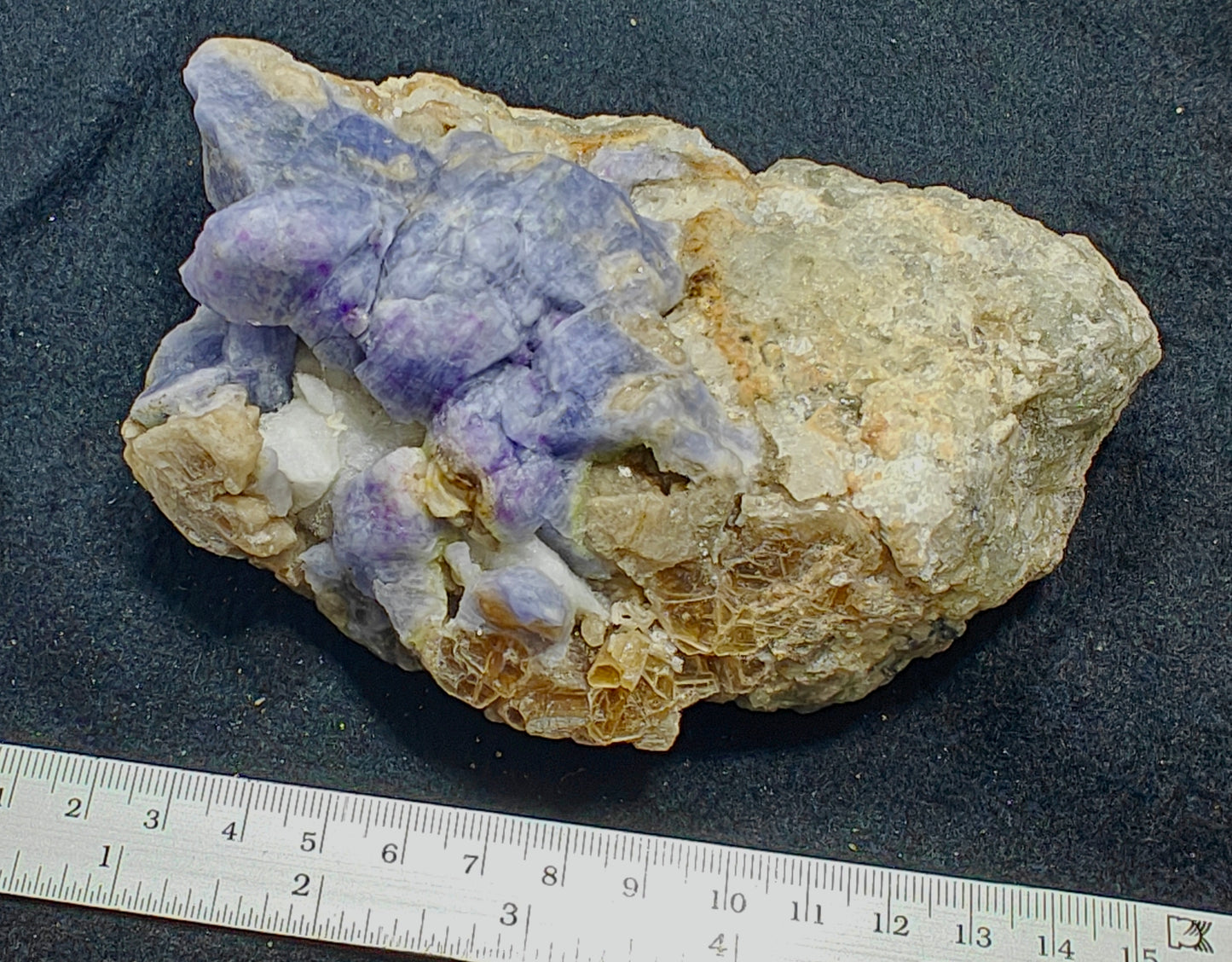 Natural hackmanite specimen on matrix 730 grams