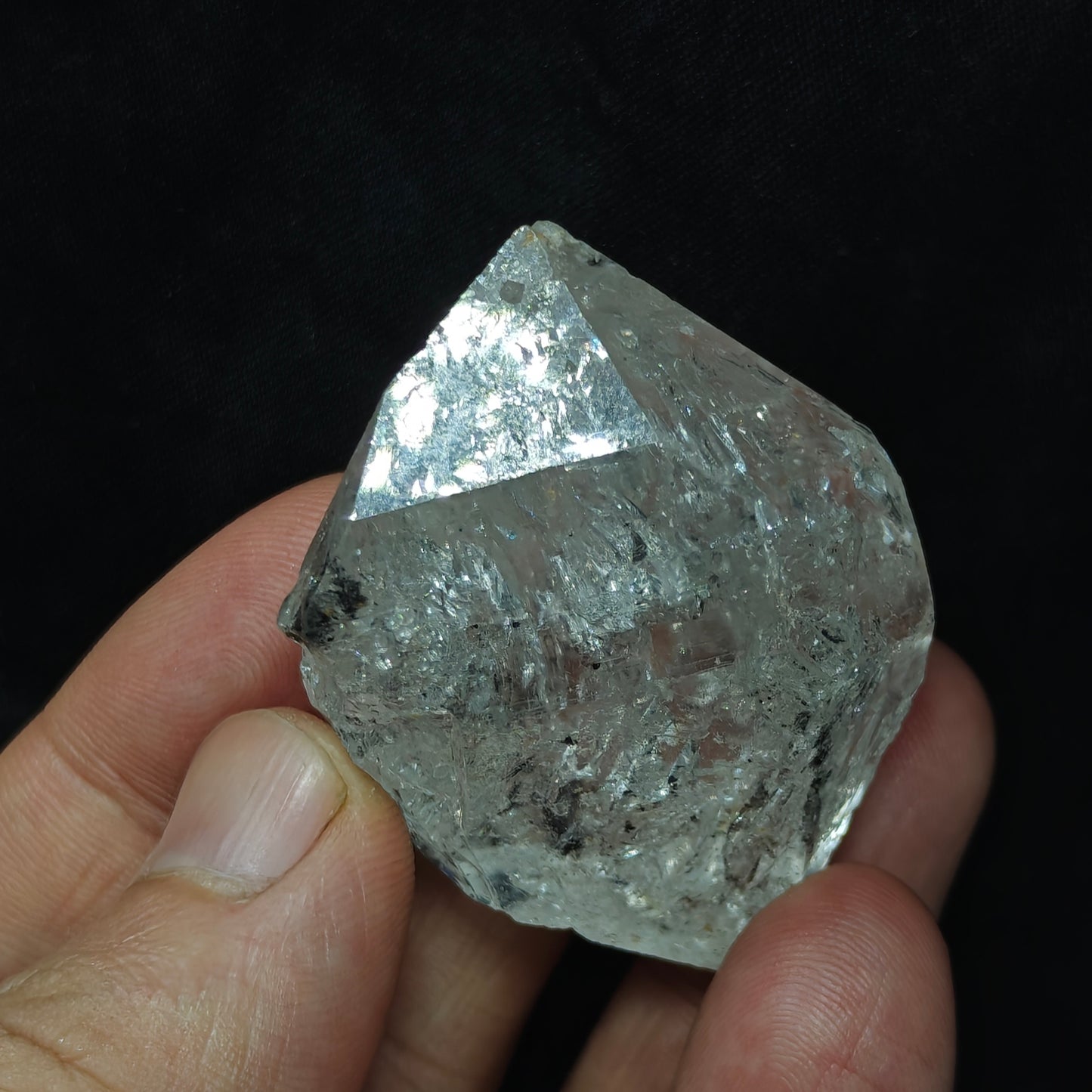 double terminated diamond like quartz crystal with carbon inclusions 57 grams