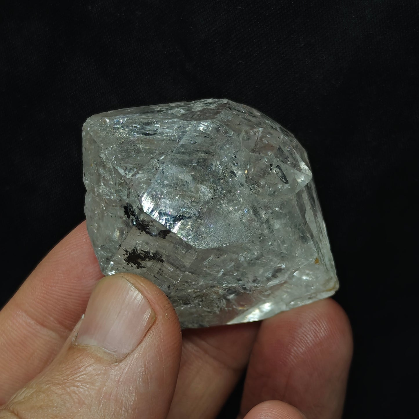 double terminated diamond like quartz crystal with carbon inclusions 57 grams