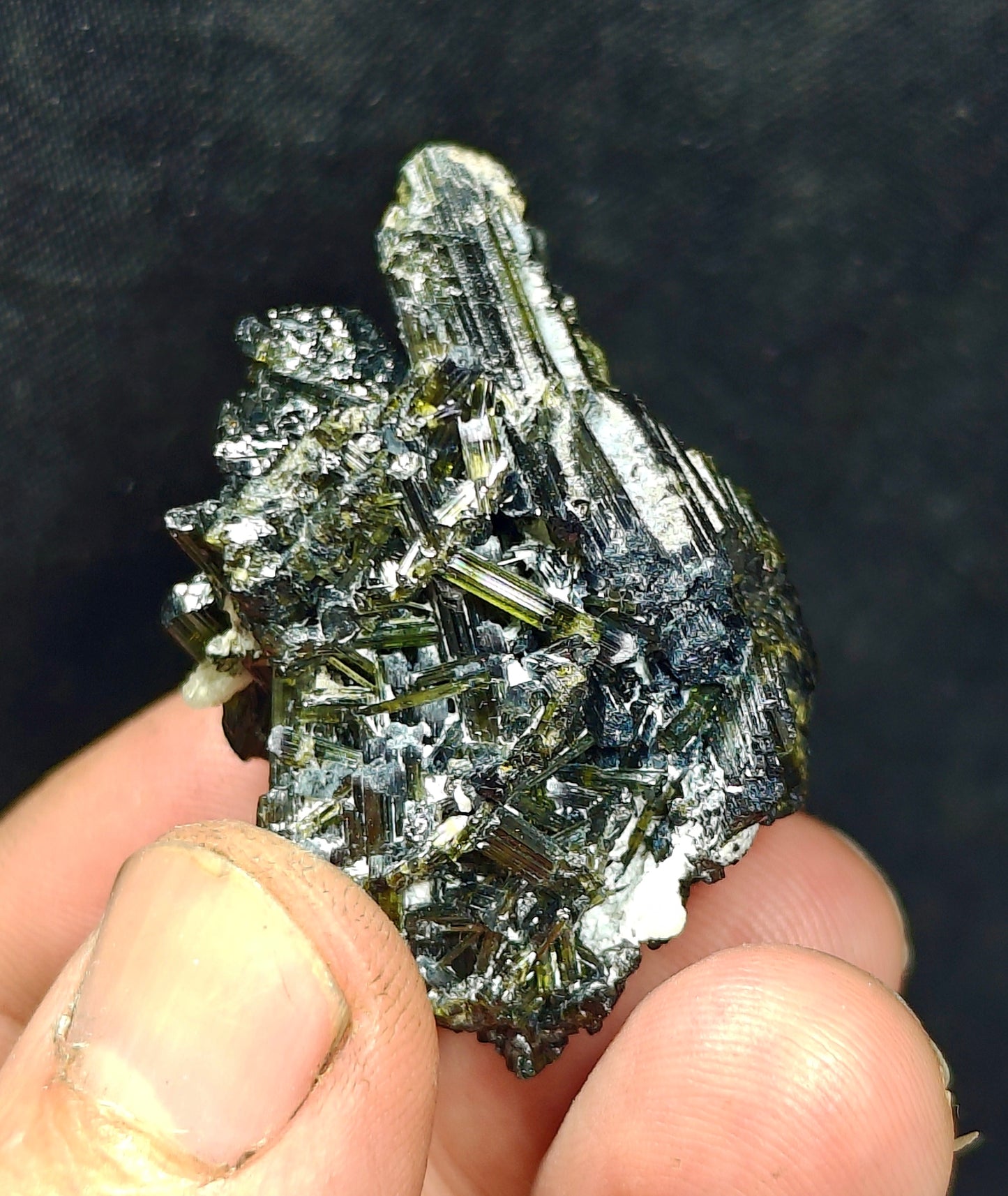 Dark green color Tourmaline crystal with chatoyance effect 50 grams