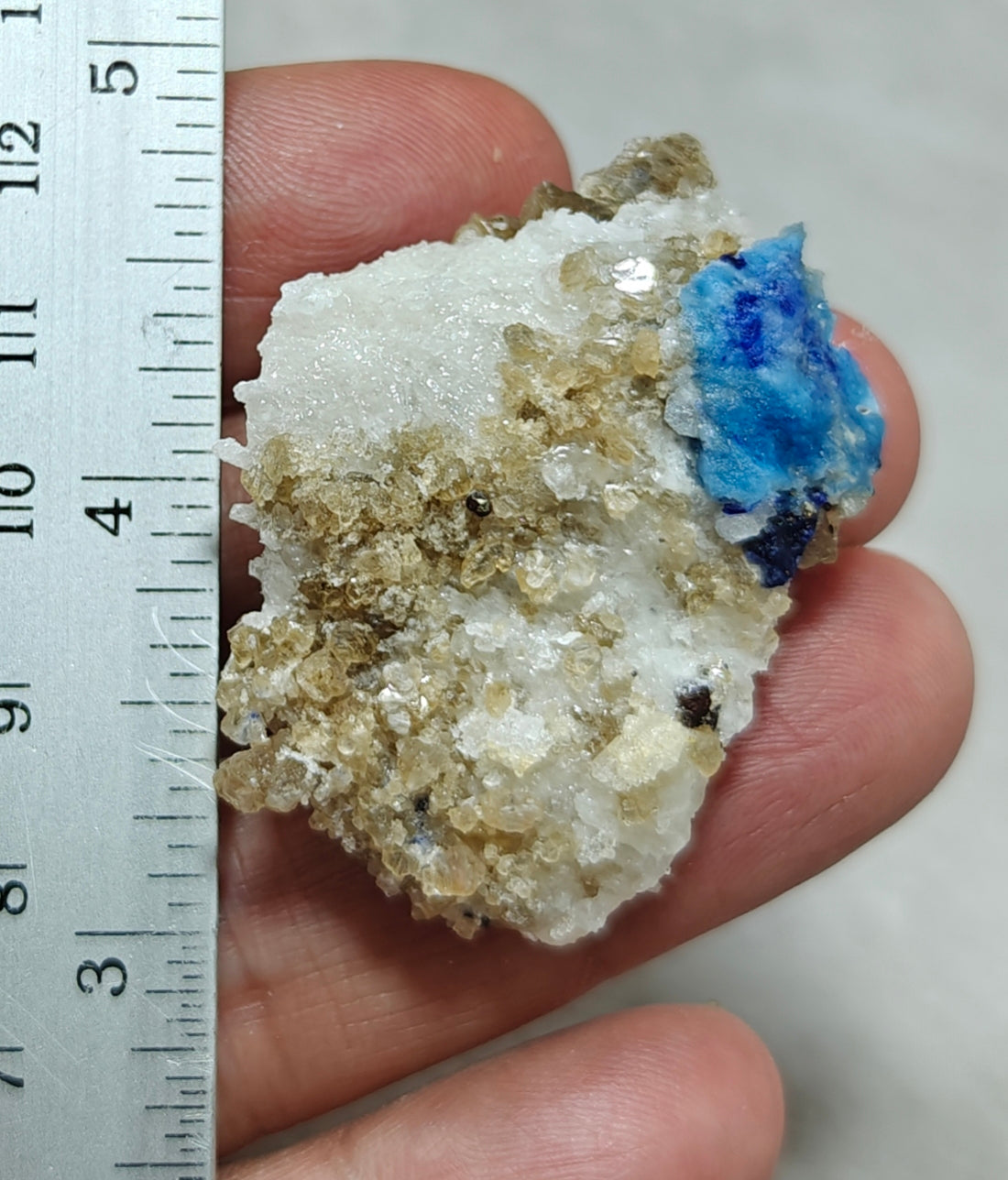 Afghanite Fluorescent in matrix with some pyrite and phlogopite 25 grams