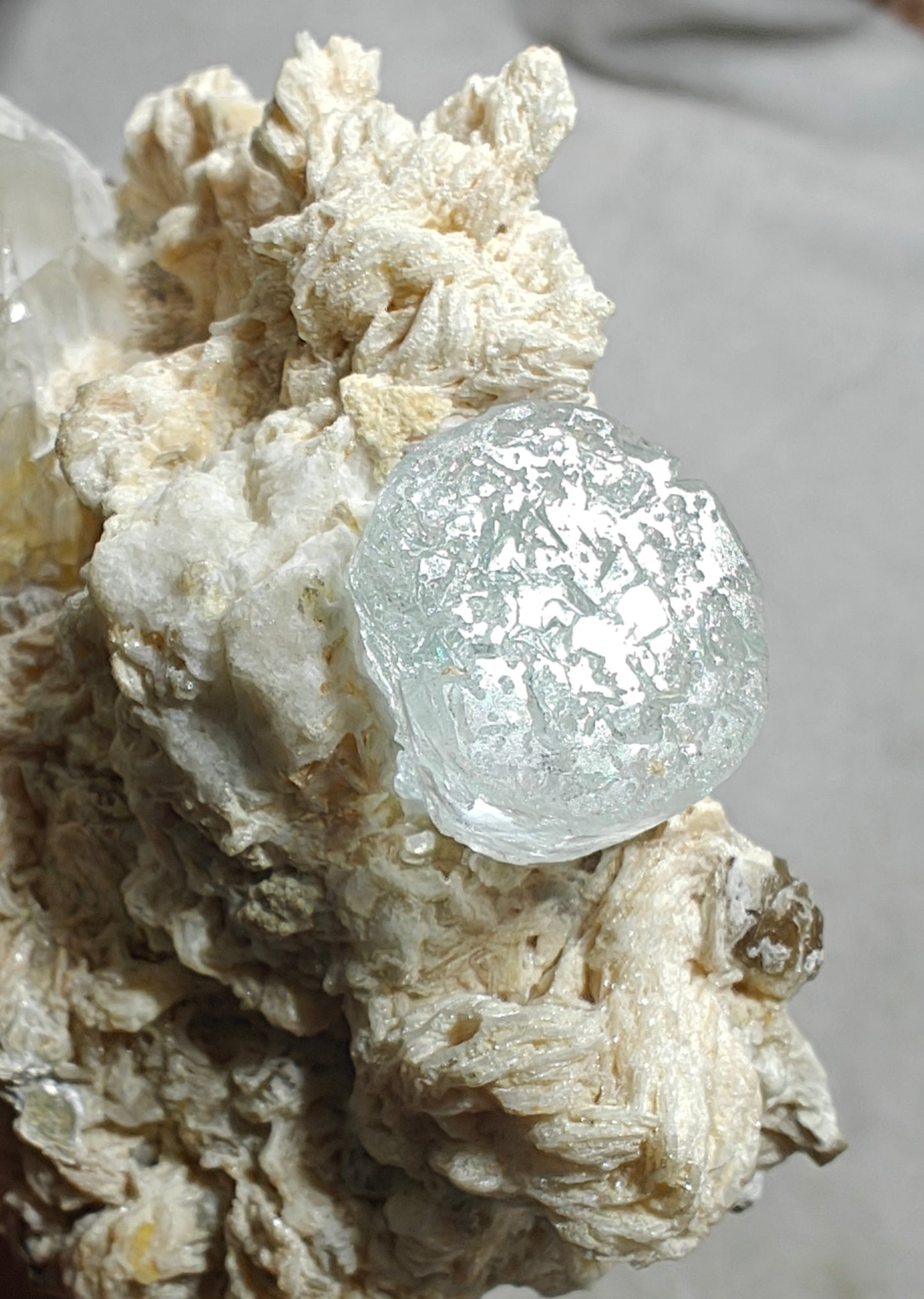 An aesthetic Specimen of etched Aquamarine on matrix with quartz 206 grams