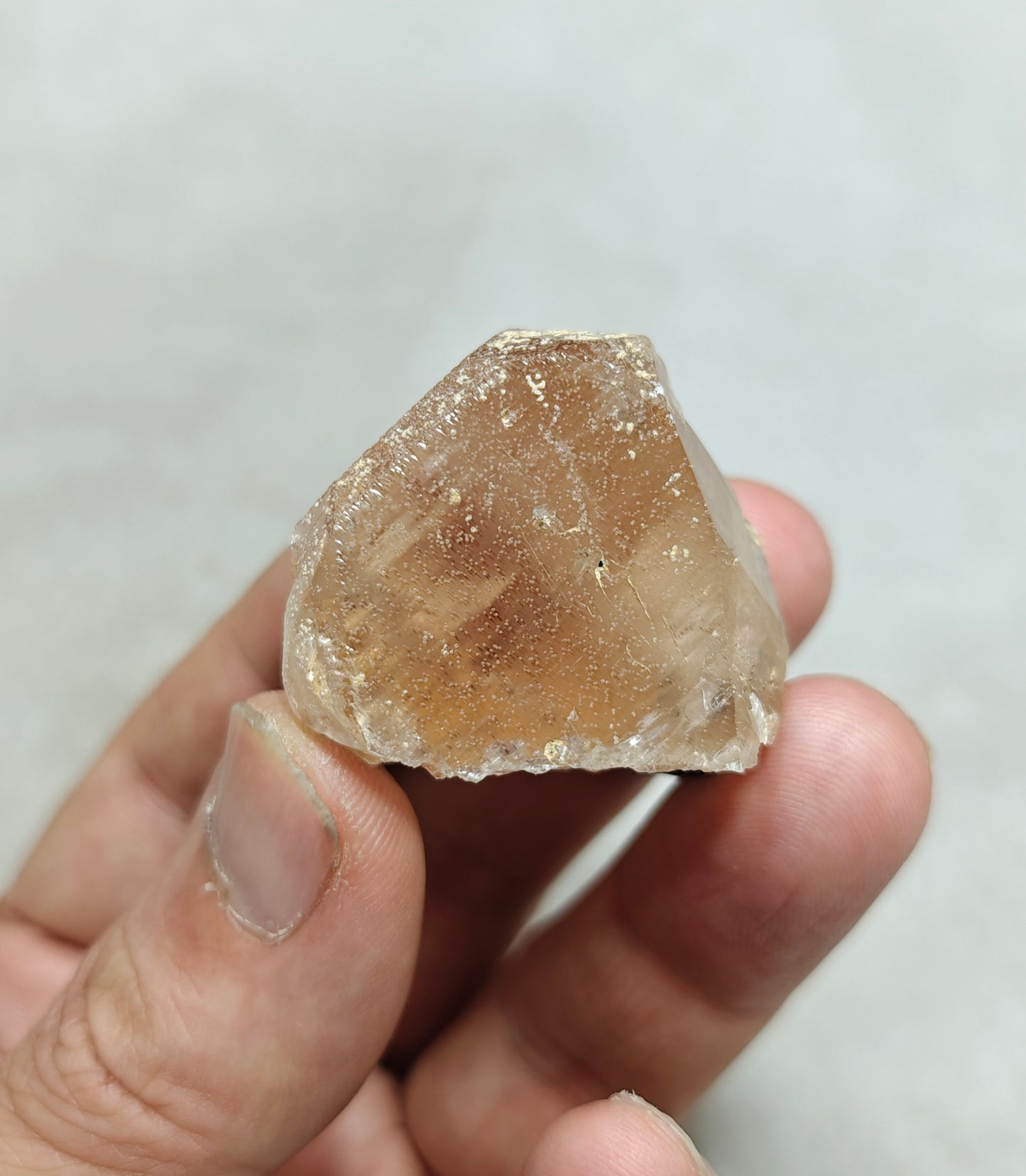 Peach color Topaz crystal with Tourmaline 68 grams