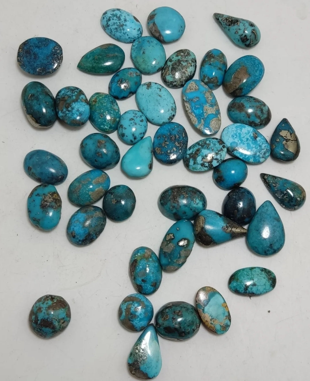 An amazing lot of turquoise cabochons 138 grams