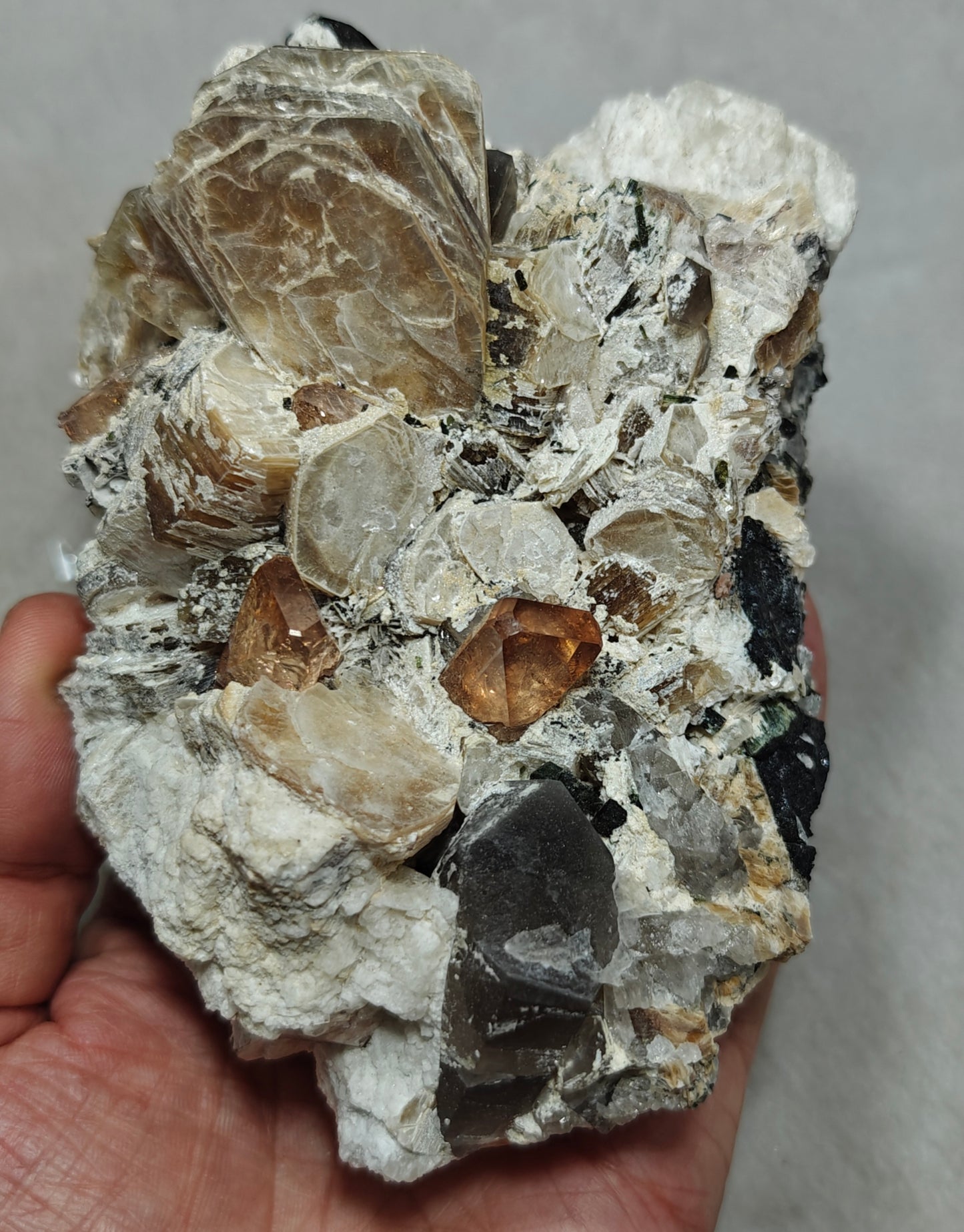 peach color Topaz crystals on matrix 686 grams