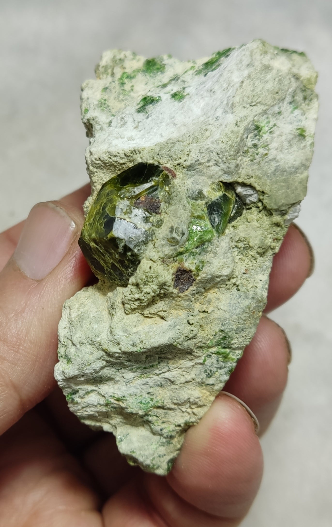 An Aesthetic specimen of garnet variety demantoid crystal On Matrix 140  grams