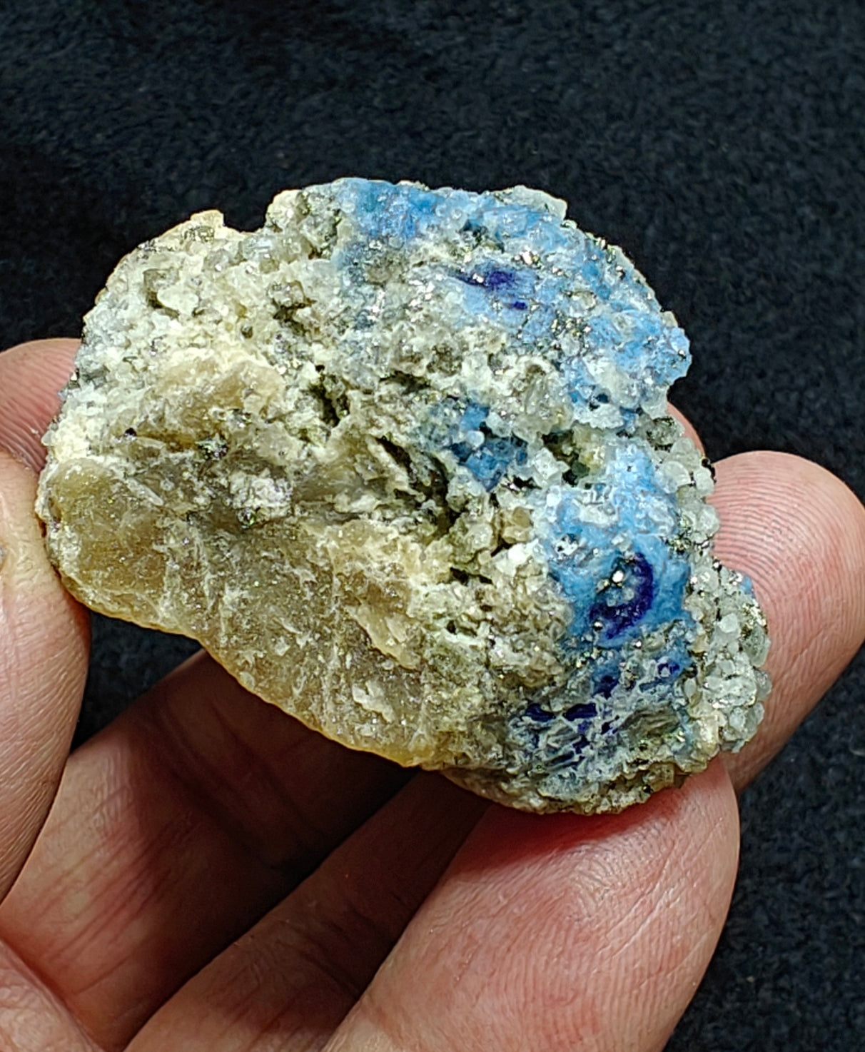 Afghanite Fluorescent in matrix with some pyrite calcite 88 grams