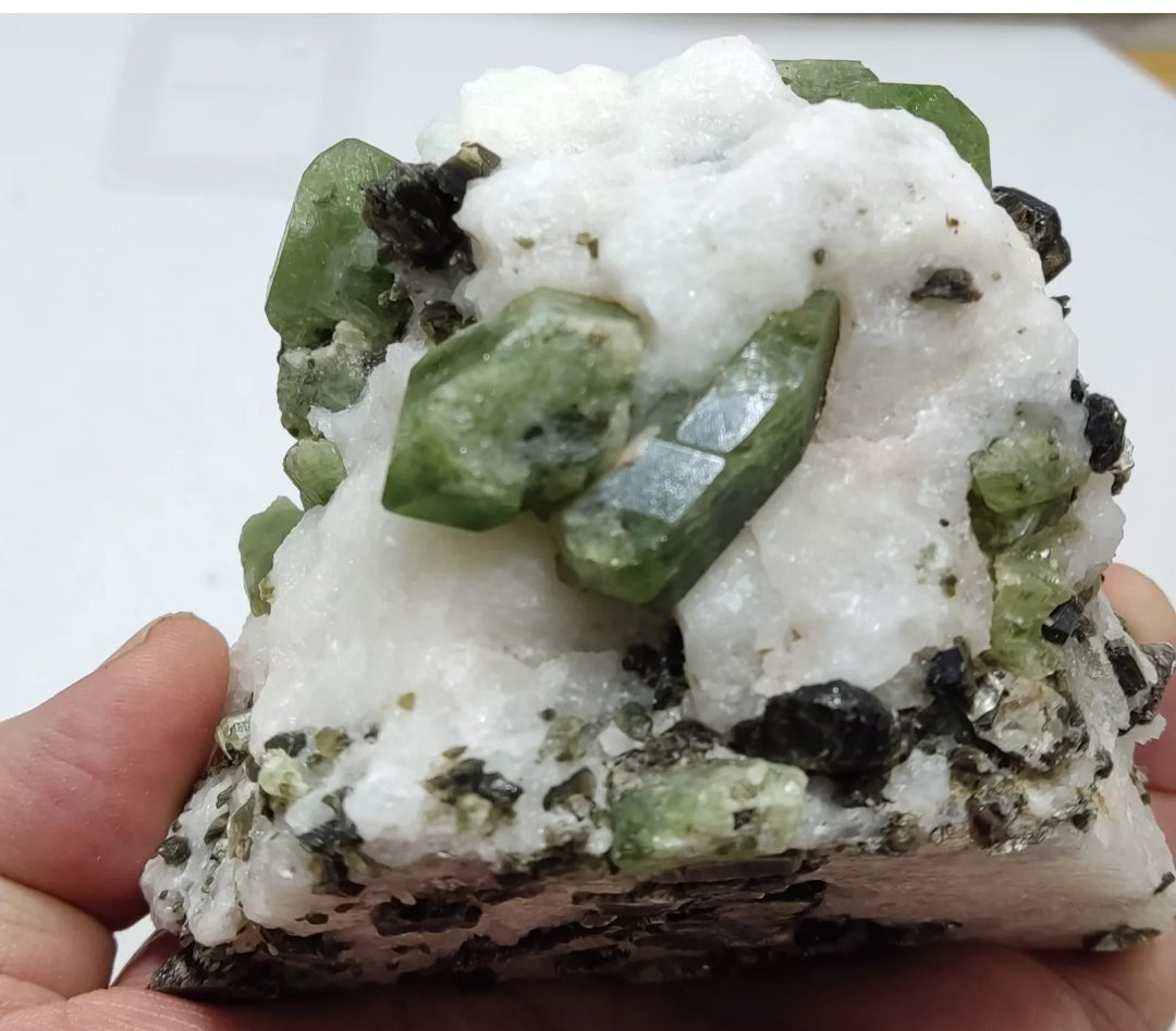 Diopside crystals on matrix with black/dark brown mica 811 grams