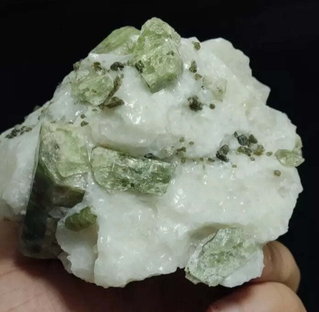 Green diopside crystals on matrix with mica 1067 grams