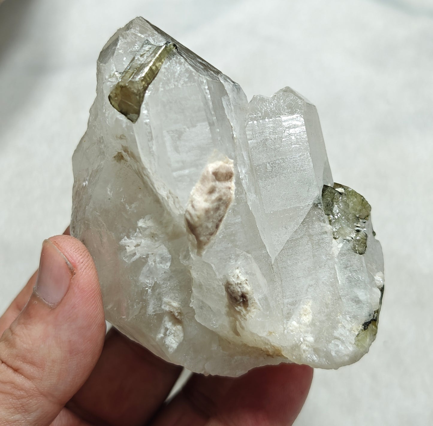An amazing beautiful specimens of light pink and green Tourmaline embedded in terminated quartz 323g