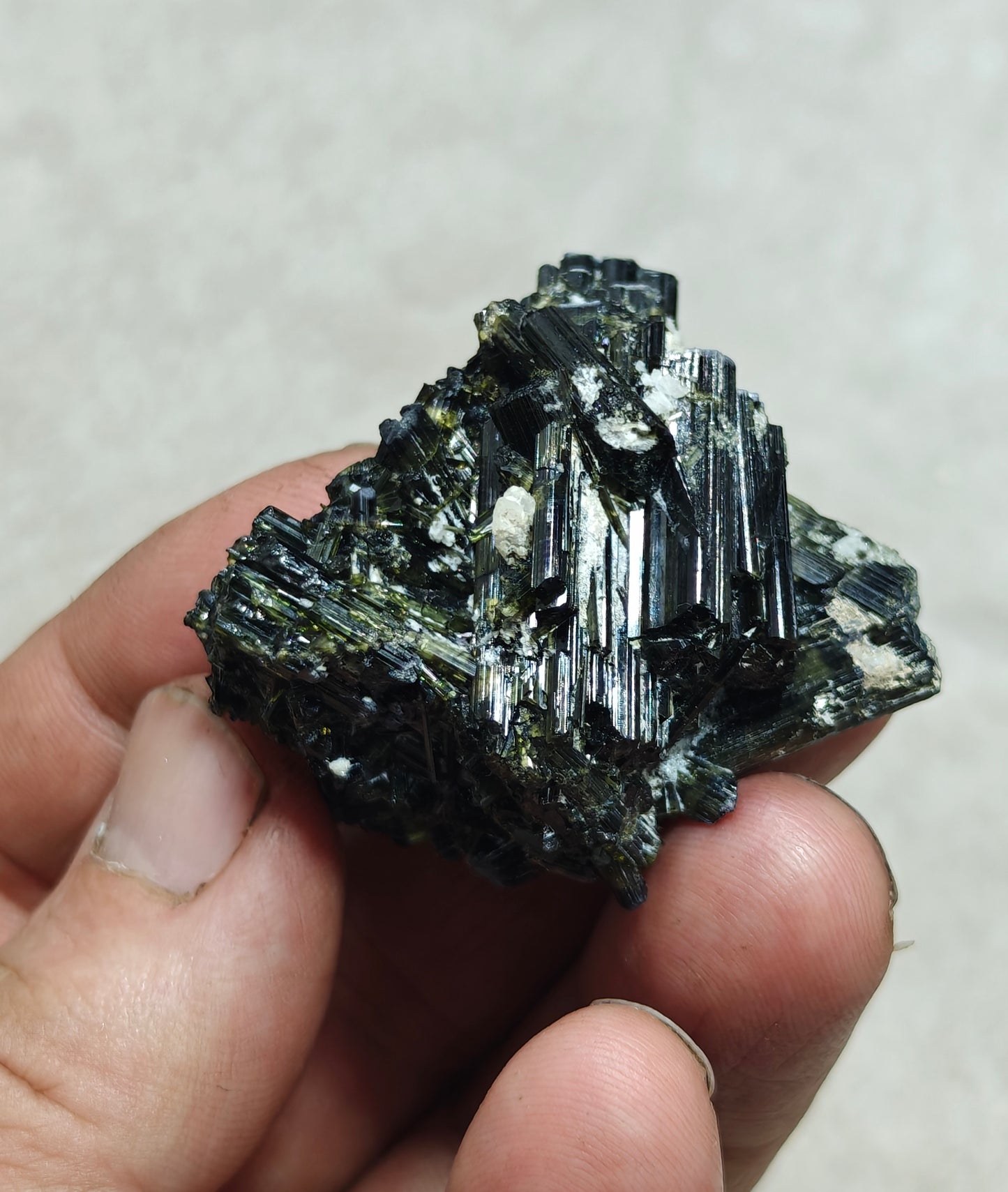 Dark green color Tourmaline crystal with chatoyance effect 50 grams