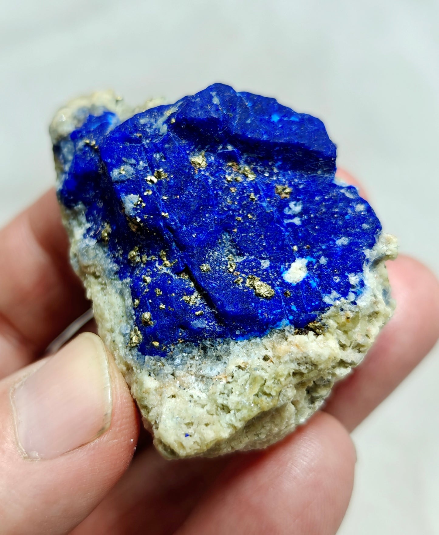 An Aesthetic specimen of Lazurite Lapis with Pyrite partly fluorescent 57g