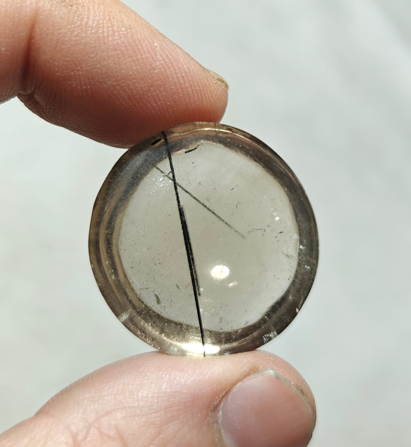 Tourmaline included smoky Quartz cabochon 64 carats