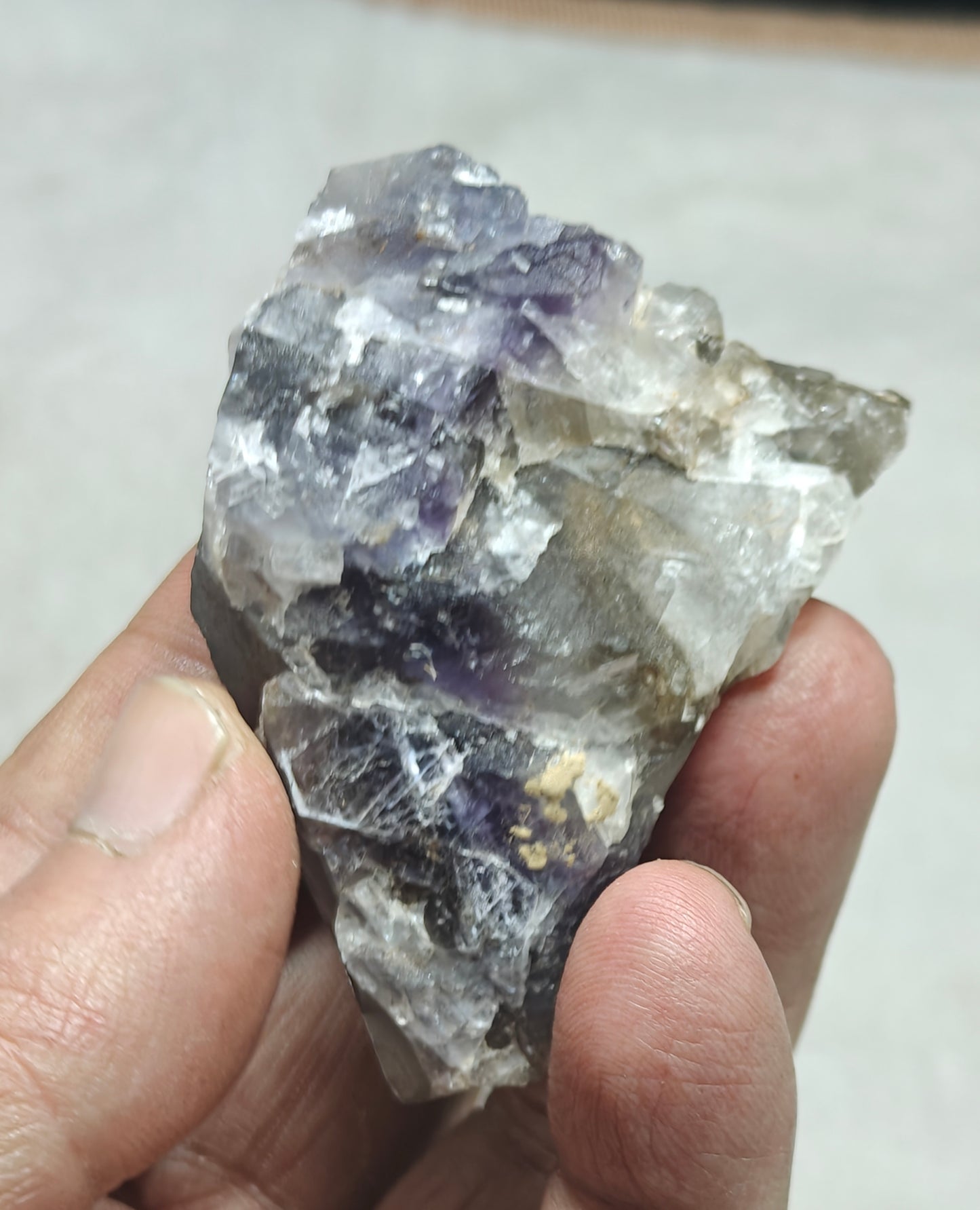 An amazing Single beautiful specimen of grey/purple fluorite with calcite crystals 150 grams