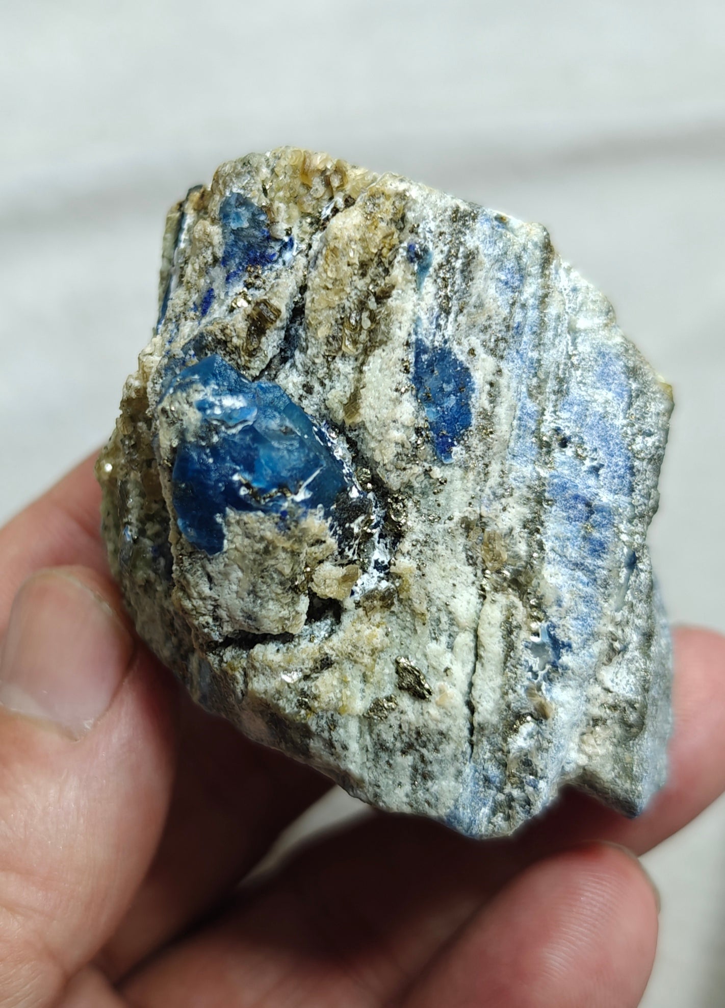 Afghanite Fluorescent in matrix with some pyrite 190 grams