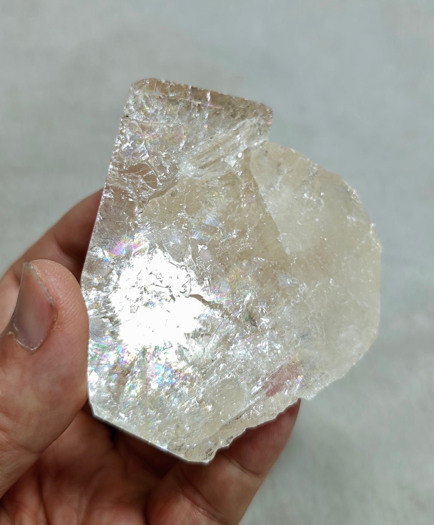 Natural light peach color Topaz crystal with rainbow effects with associated tourmaline 200 grams